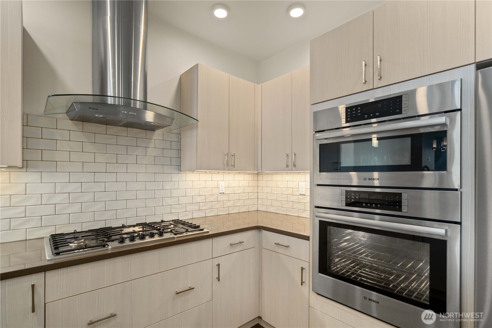 Gas stove with built in microwave and oven