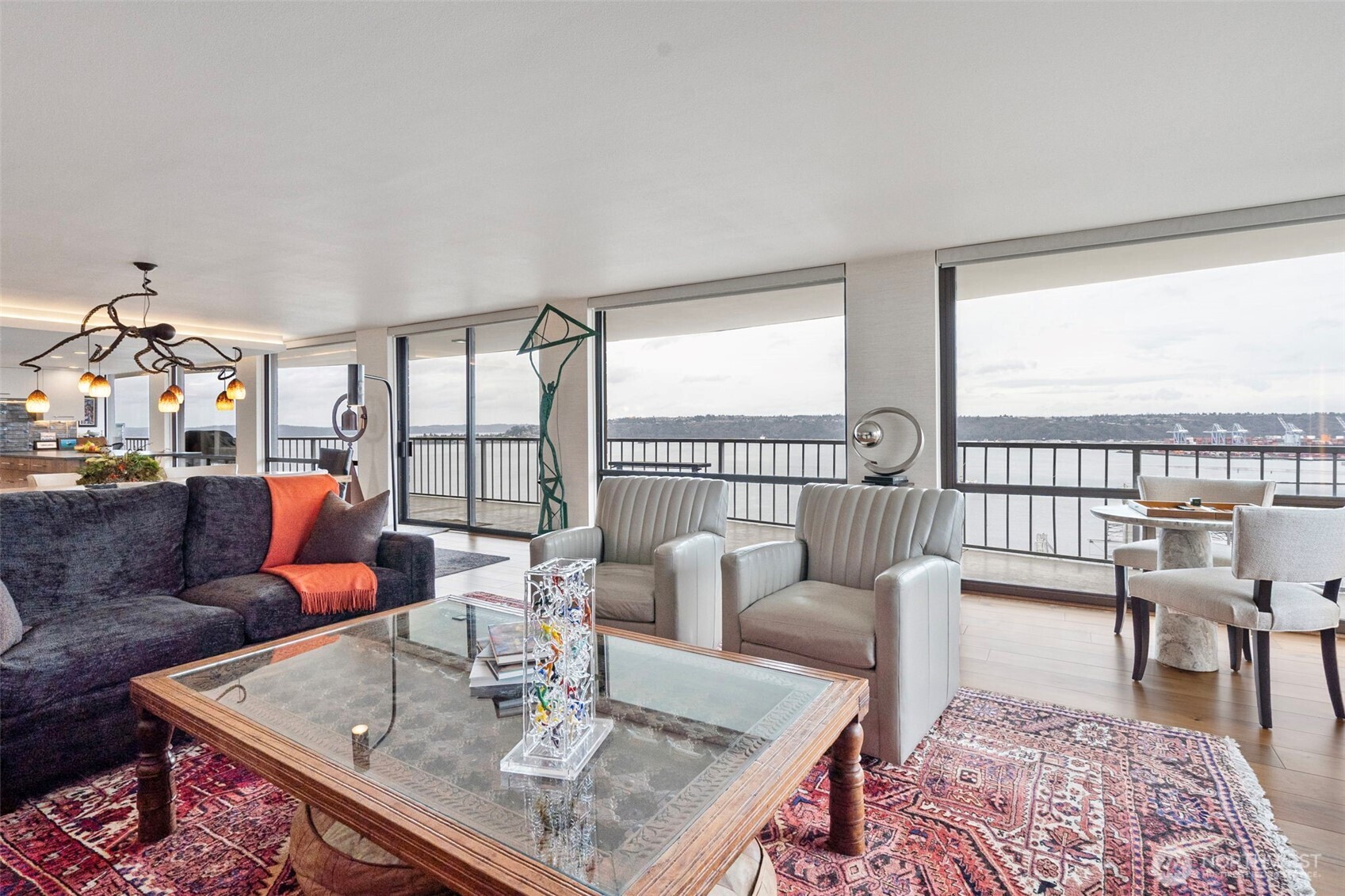 Large windows align with the length of the water view side.