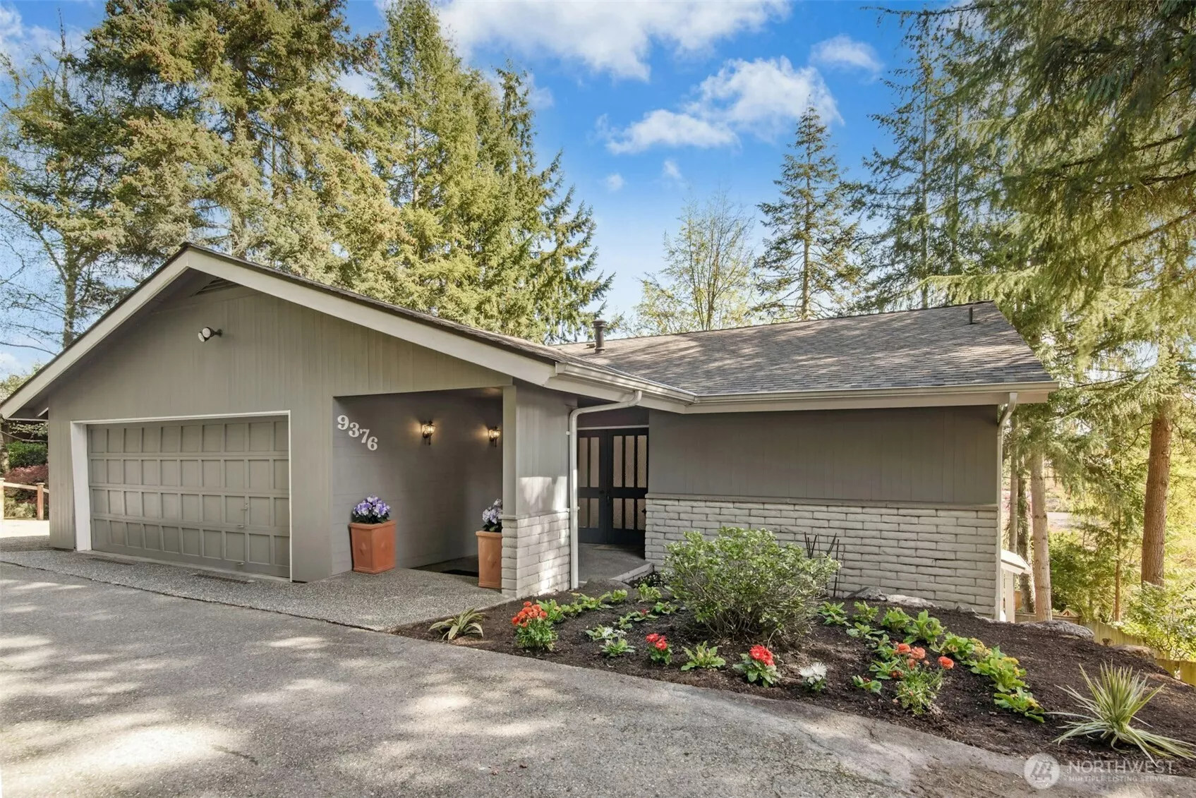 Amazing, centrally located Mercer Island home offers classic mid-century style with a generous multilevel floor plan