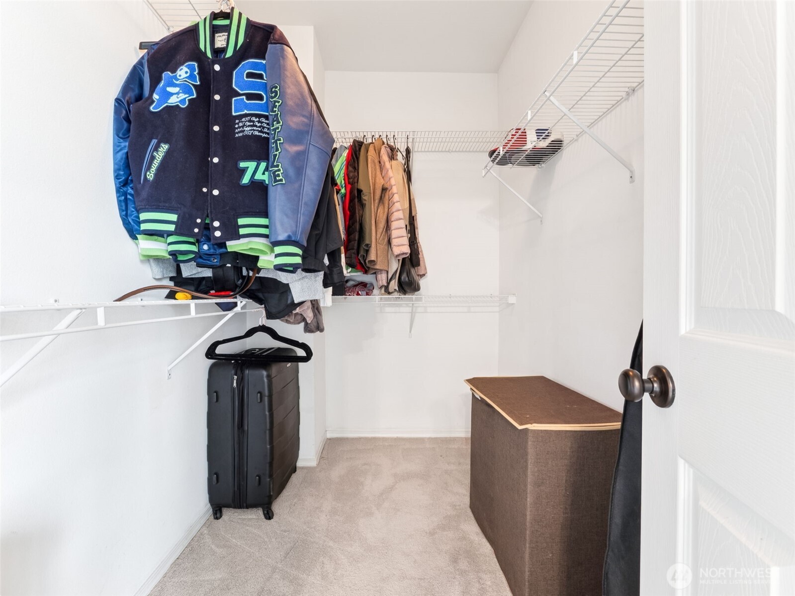 Spacious primary bedroom walk-in closet.
