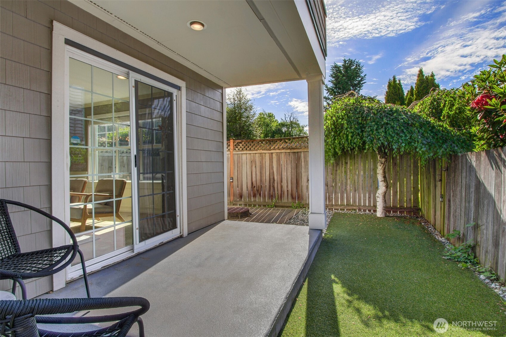 Back porch with turf yard.