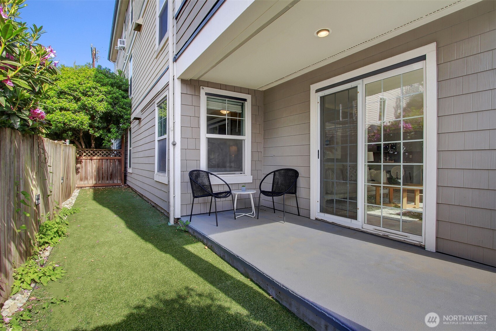 Back porch with turf yard.