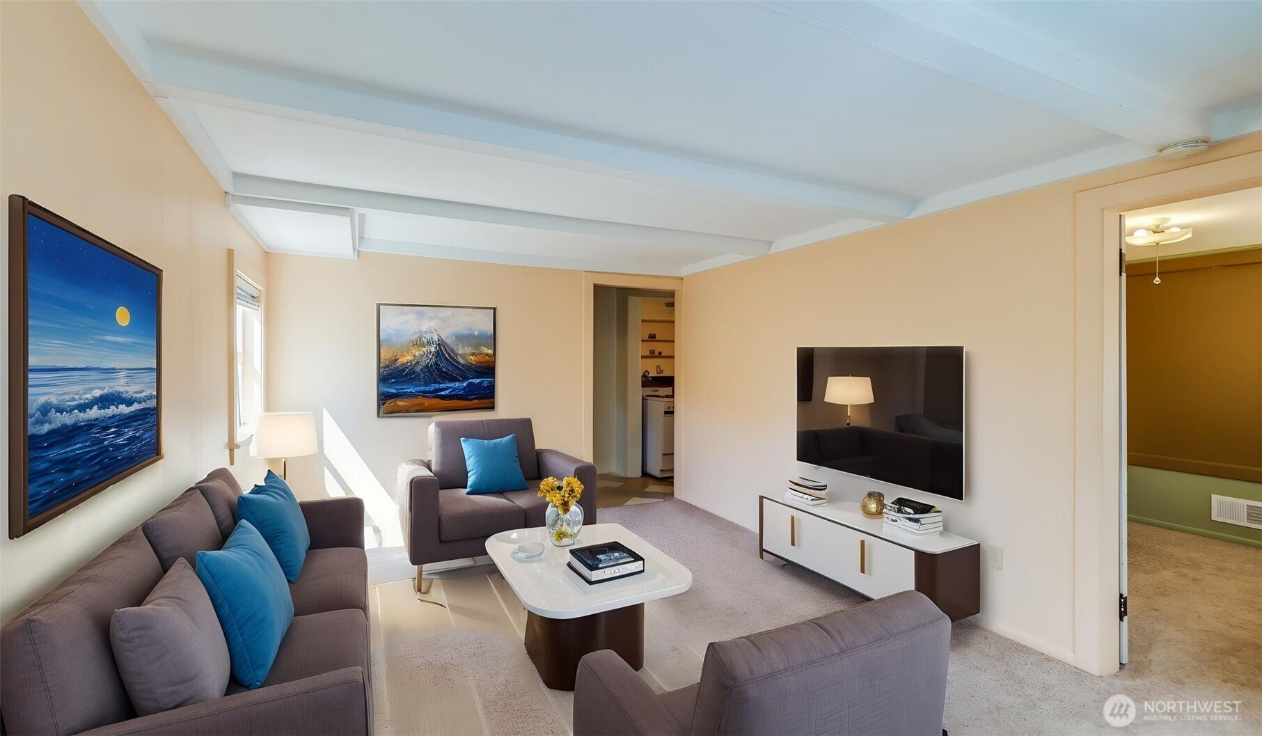 Downstairs: Living room, virtually staged.