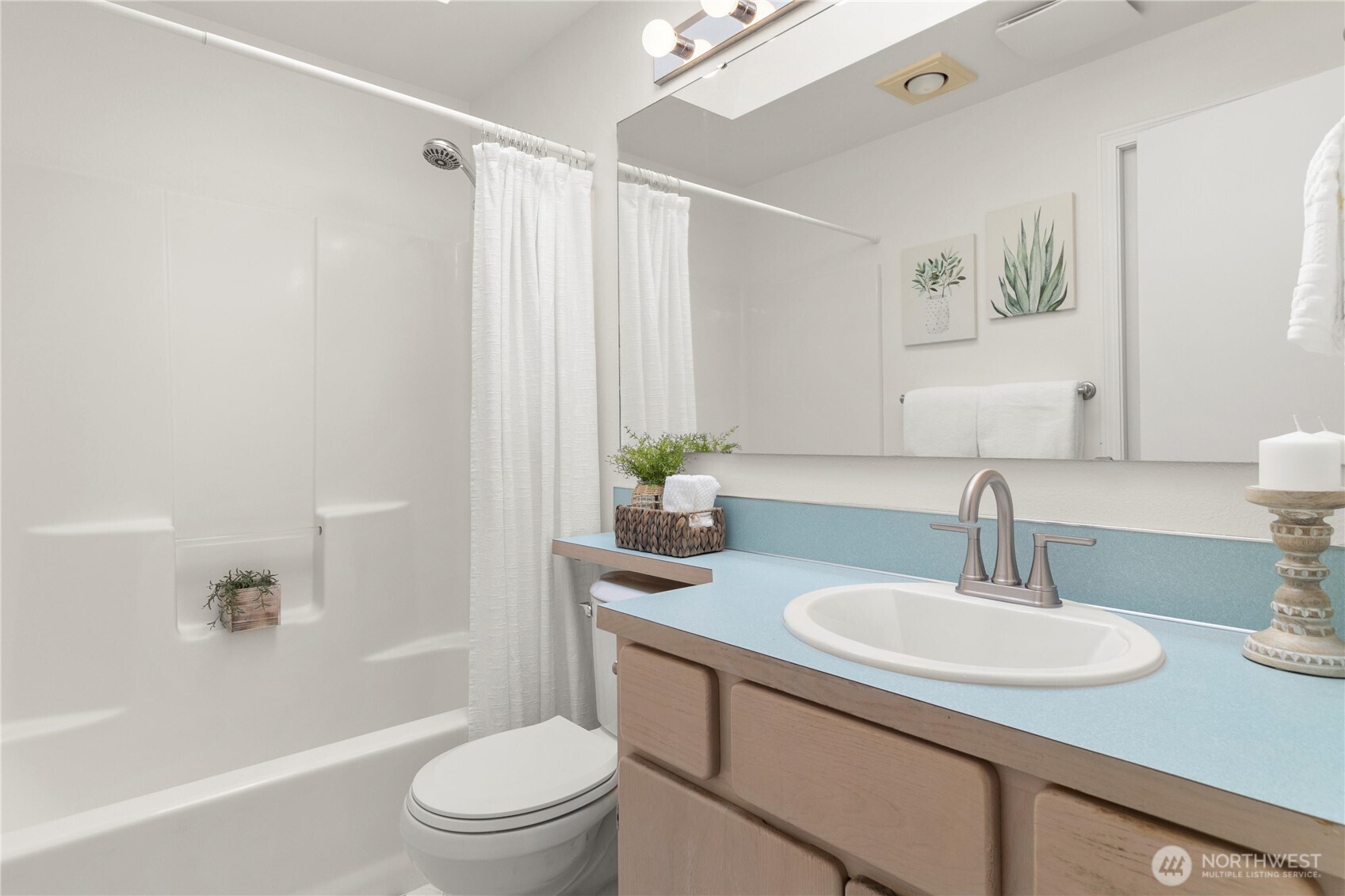 Upper level bathroom with primary access. Jack & Jill entry from main hallway.
