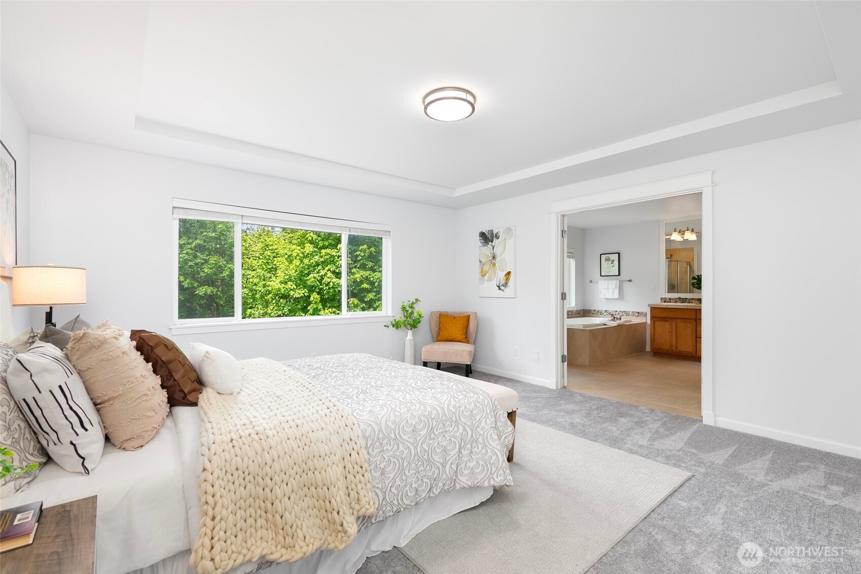 Versatile loft filled with natural light—easily convertible into an additional enclosed room, if desired.