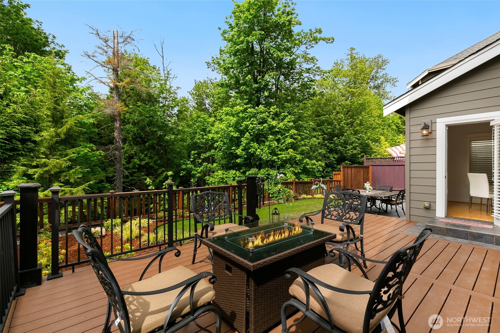 A perfect stunner tucked away on a scenic greenbelt in Issaquah Highlands offering peaceful privacy with the perks of vibrant community living.