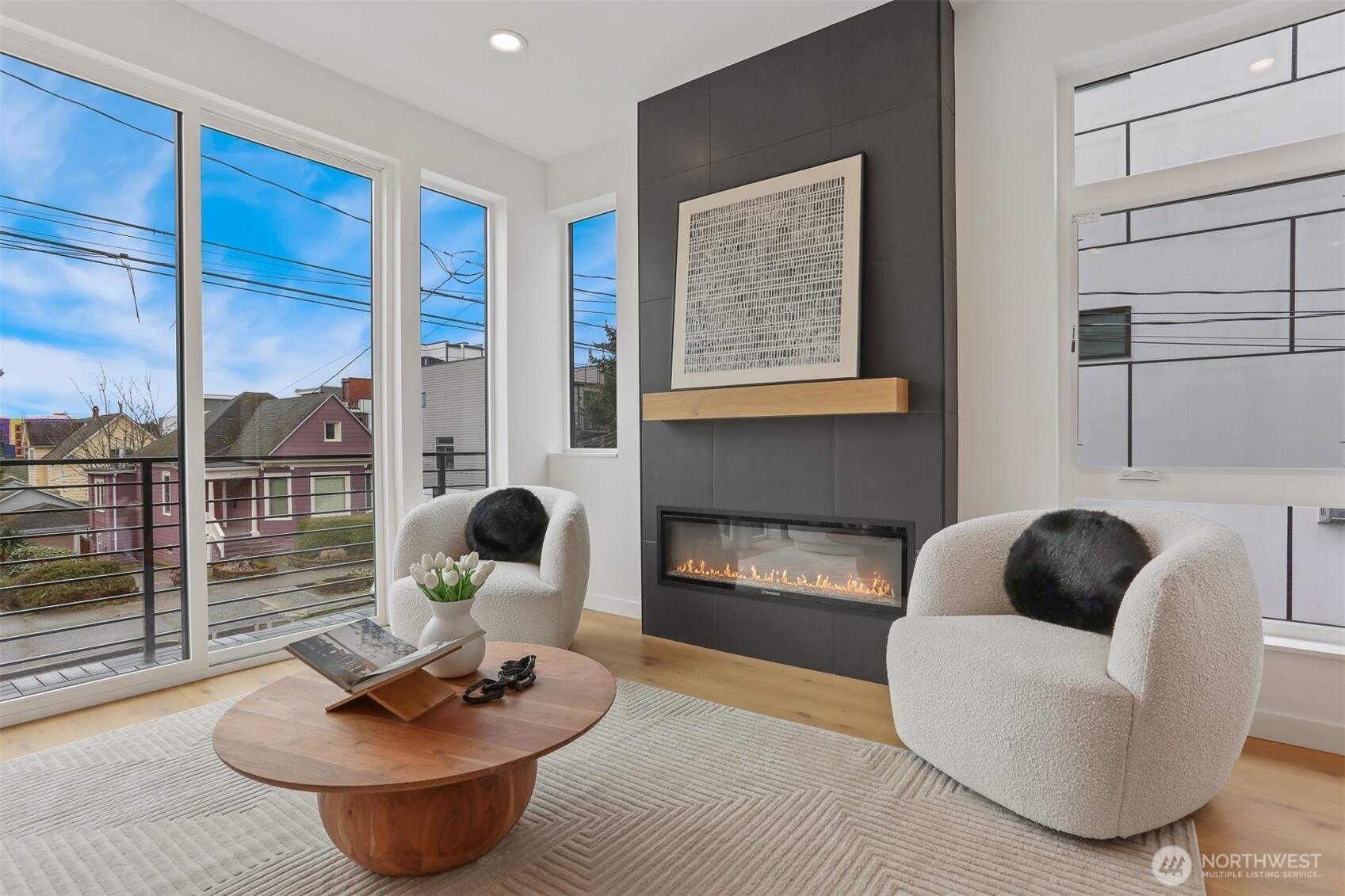 Sleek, Modern Fireplace with Floor to Ceiling Surround