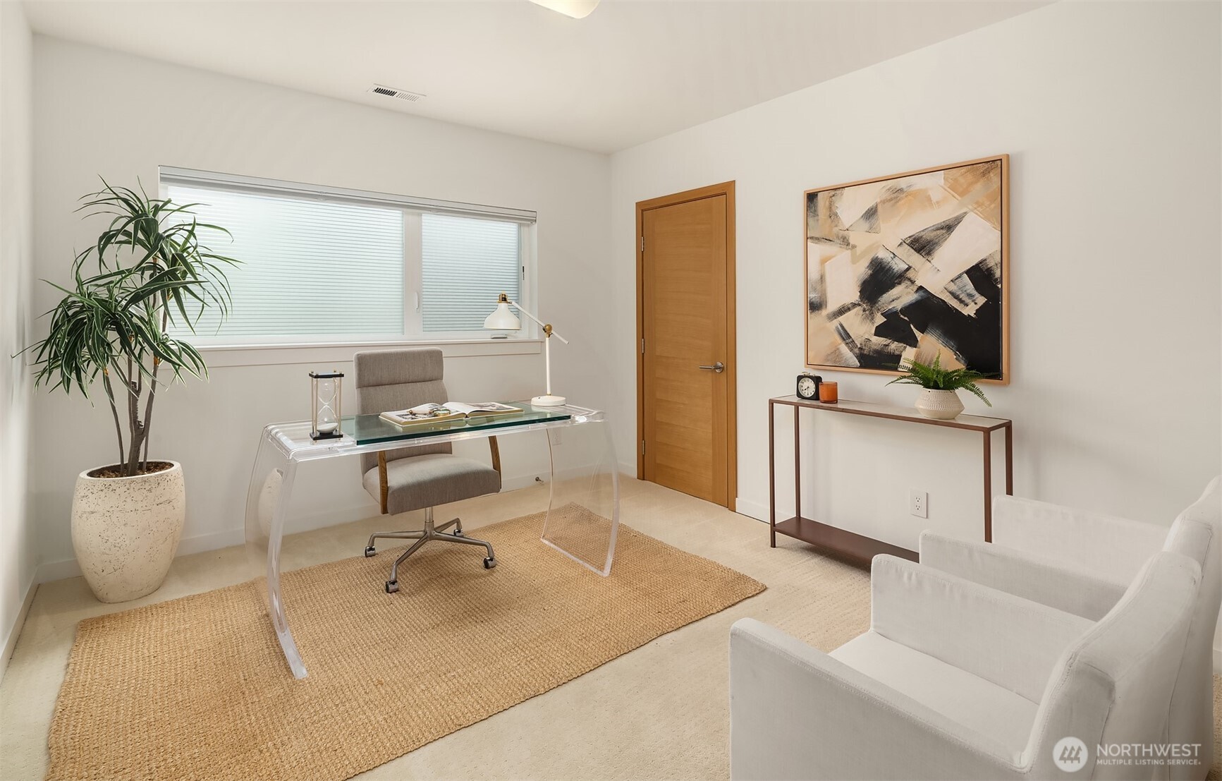 The 4th bedroom, office or gym on the lower level. The closet offers organizers.