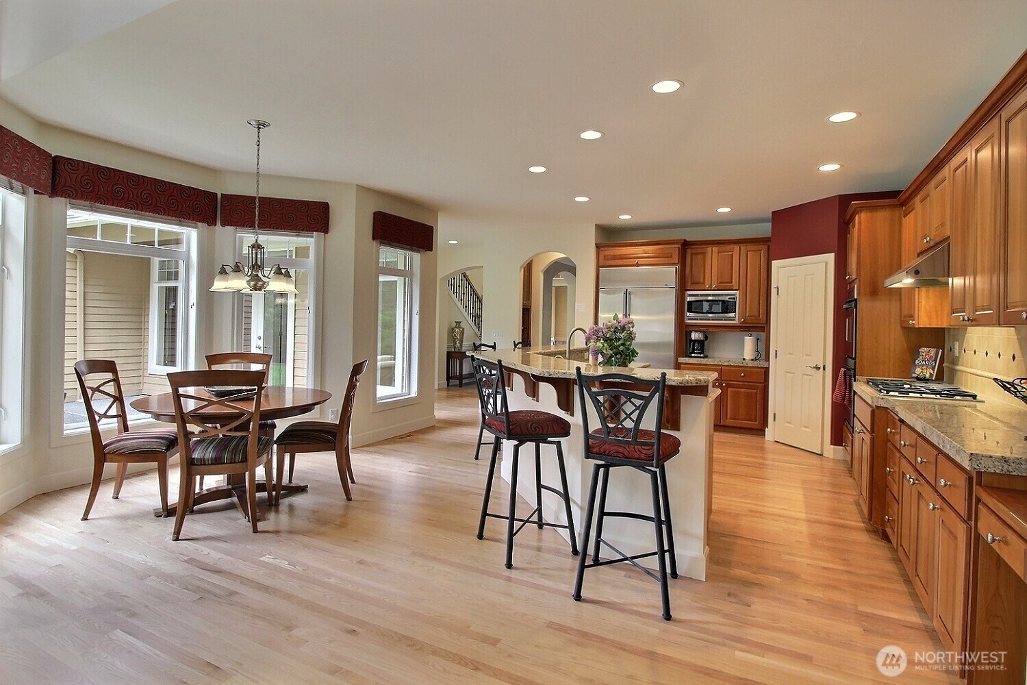 Refinished hardwoods lead to the main floor bedroom or office, and 3/4 bath.