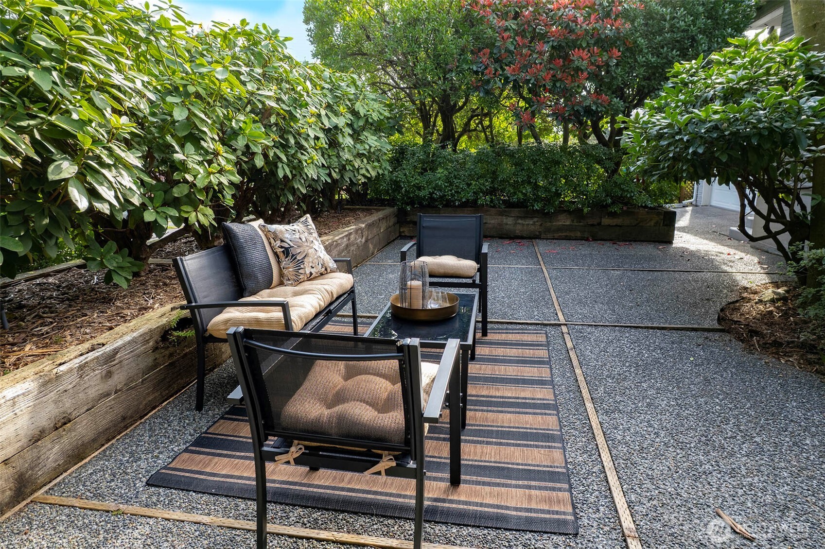 Another view of the patio, with the garage barely visible at the back of the photo.