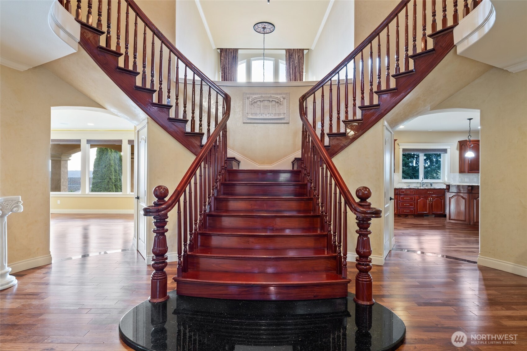 Grand stairs to the upstairs.