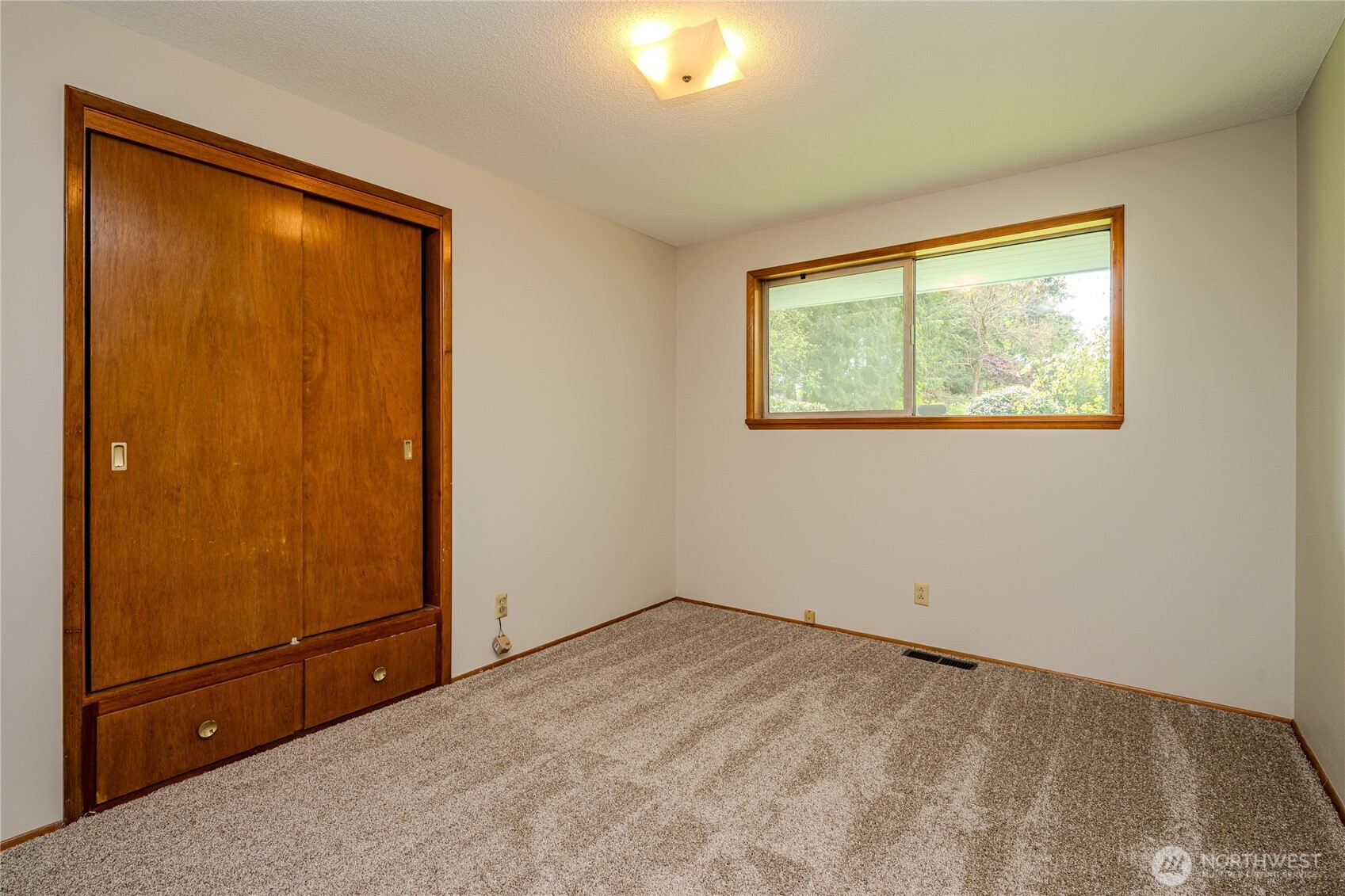 Bedroom #2 with backyard views