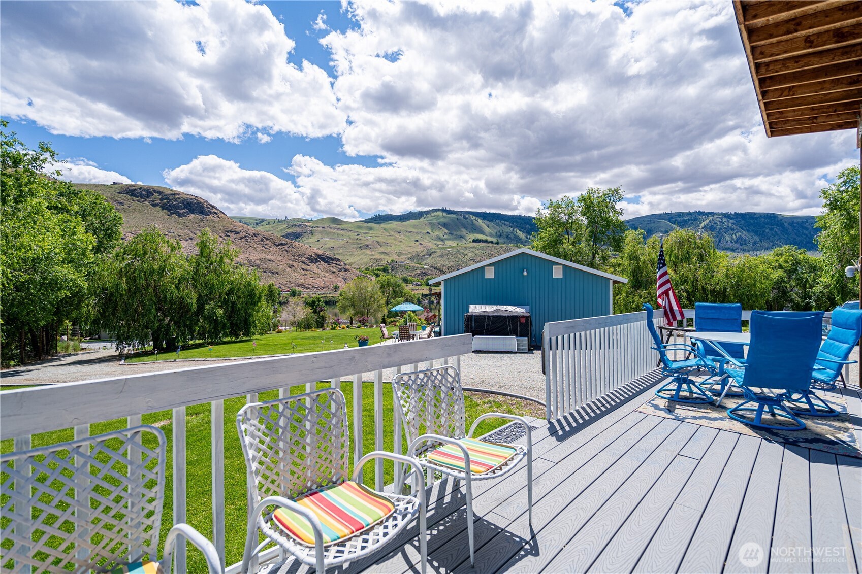 Level property with covered RV pad with a deck and River Views