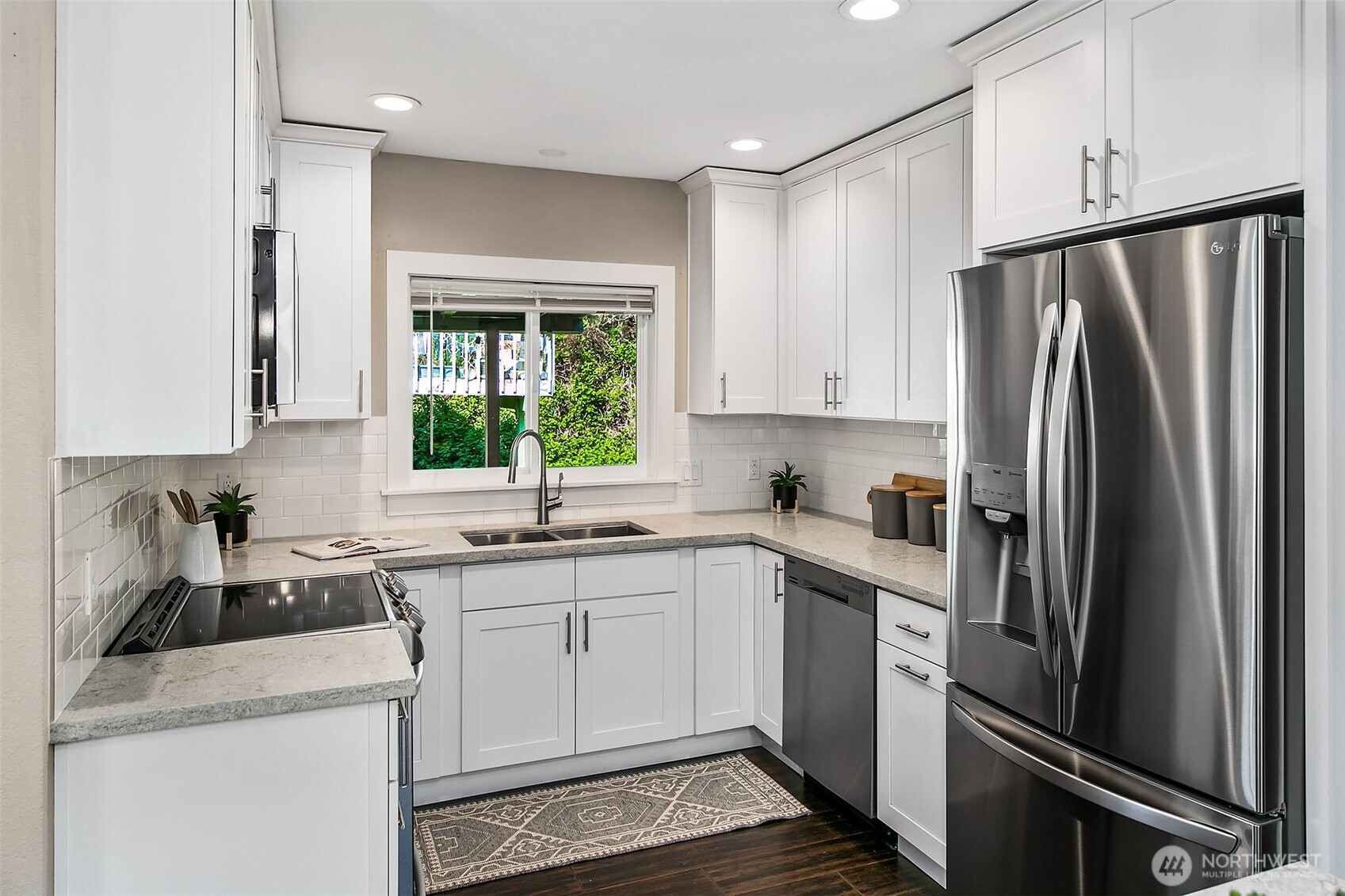 Kitchen is open and has a nice island. Dining room has access to a covered porch. All remodeled in 2018.