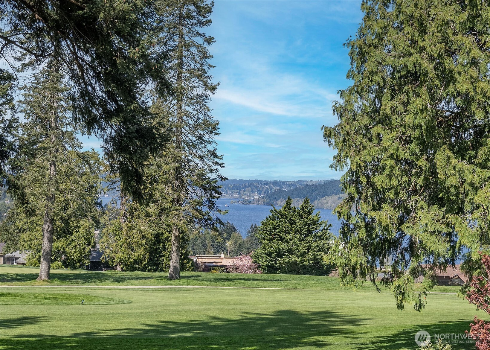 Sweeping views of the 2nd fairway, Lake Washington and the Cascade Mountains.