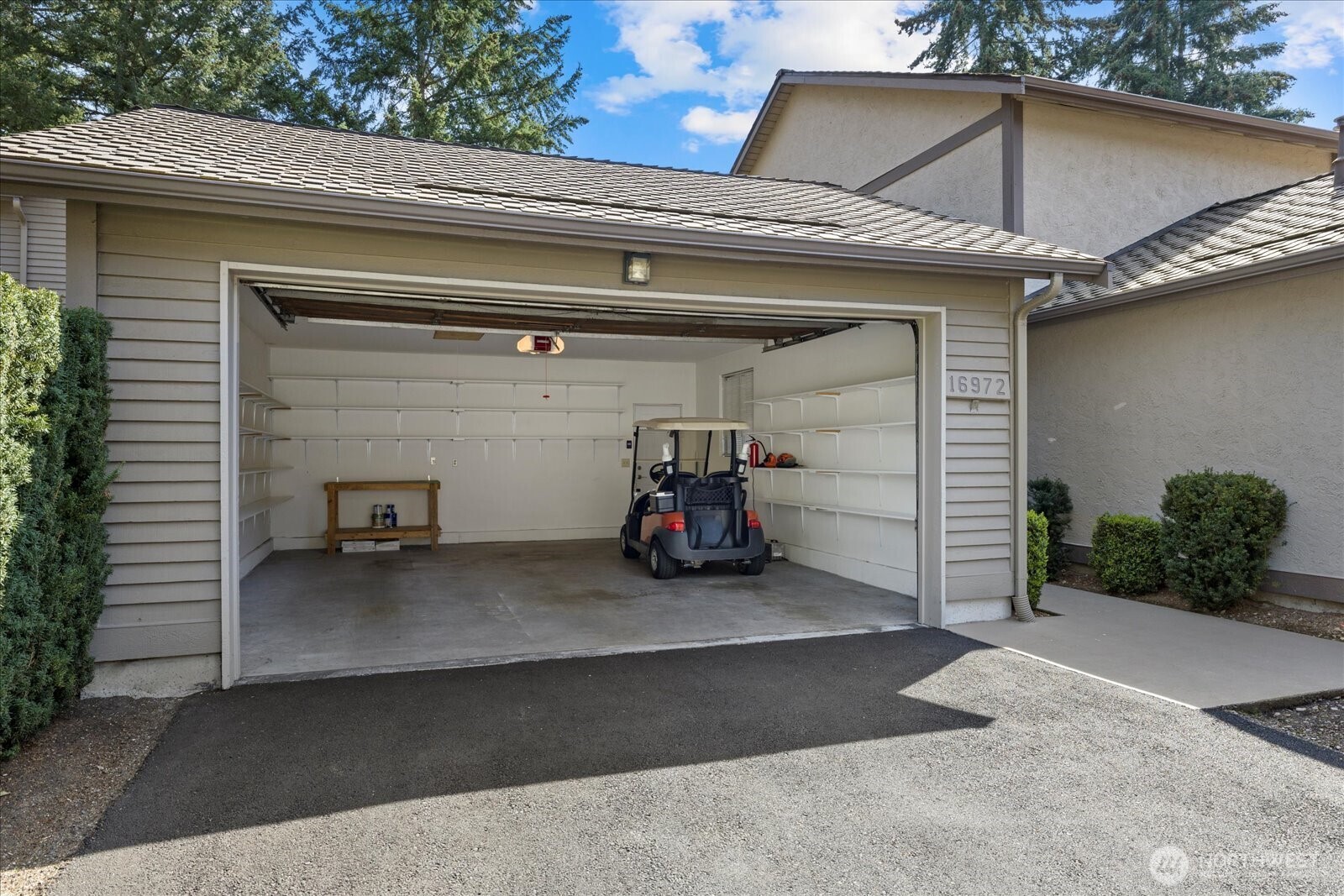 Large 2 car garage with pull down stairs for upper storage!!!