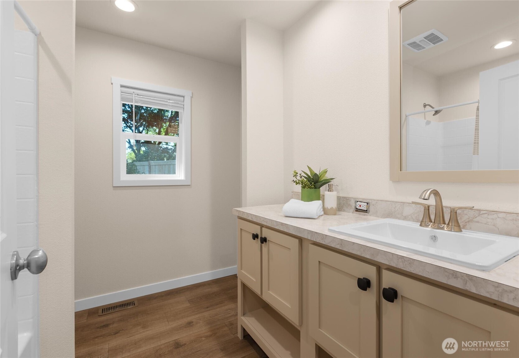 second bathroom with a tub