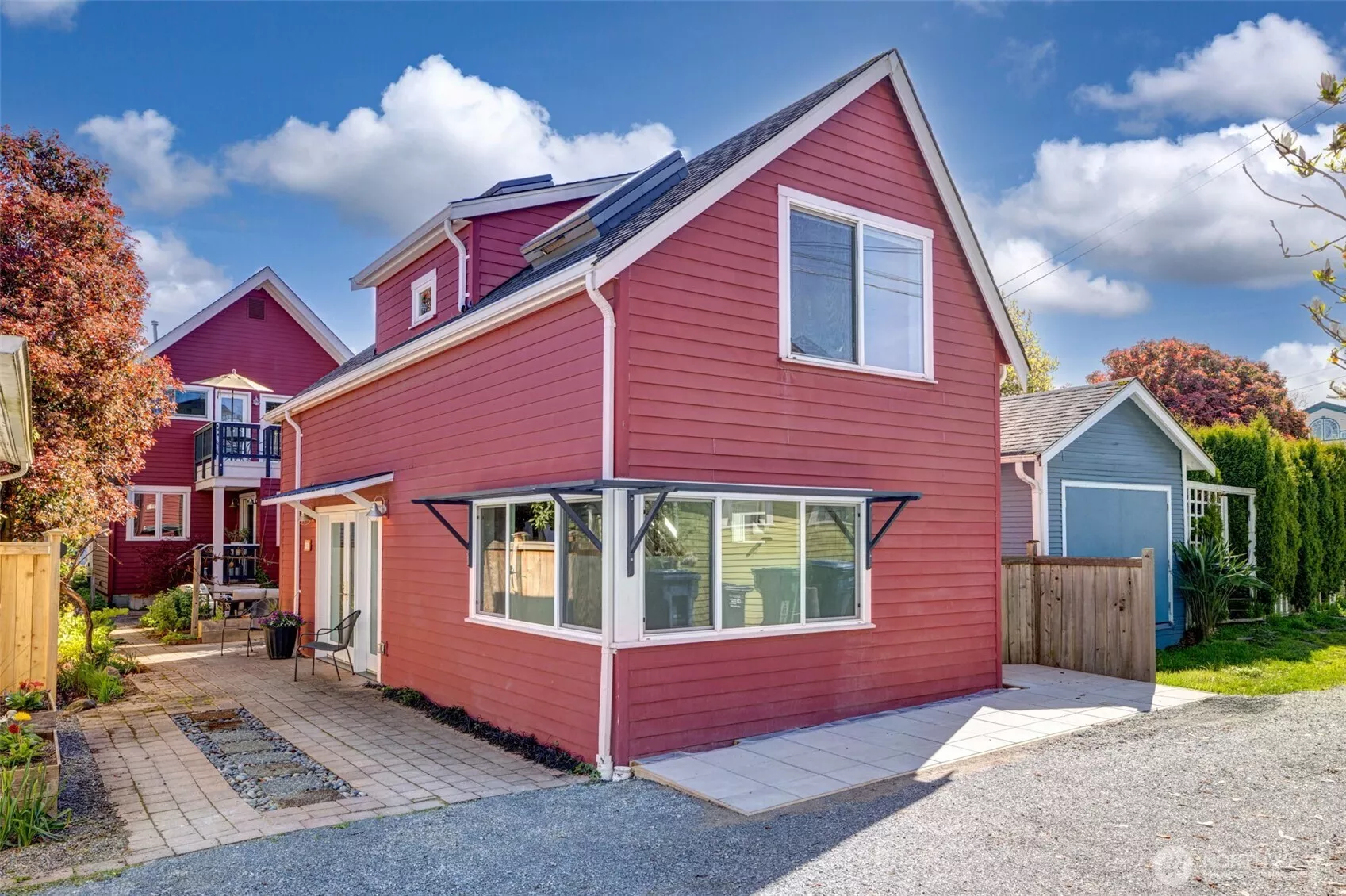 Seattle’s award-winning Bruce Parker/ Microhouse Architects, a virtuoso of small-house designs, was the premier choice for this backyard cottage when these owners became empty-nesters and shifted gears to a more efficient turn-key lifestyle.  This property is uniquely different than typical townhomes in Seattle’s dense in-city market. Here there are no shared walls, no towering buildings a few feet from your door, no shared access to your home or parking spaces, no adjoining decks. Here there is simply the quiet enjoyment of your adorable modern cottage, with low maintenance & operation costs and little to no HOA costs. Local favorites nearly at your doorstep:Zoka Coffee, Mighty-O Donuts, My Friend Derek’s Pizza, Kisaku Sushi, Metro bus # 62.  Short hops/bikes away: Greelake, Woodland Park Zoo, Roosevelt LightRail Link UW, Downtown, sports stadiums, SeaTac  Airport & beyond. Whatever you need for work or play, this is the ideal location & setting for easy living.