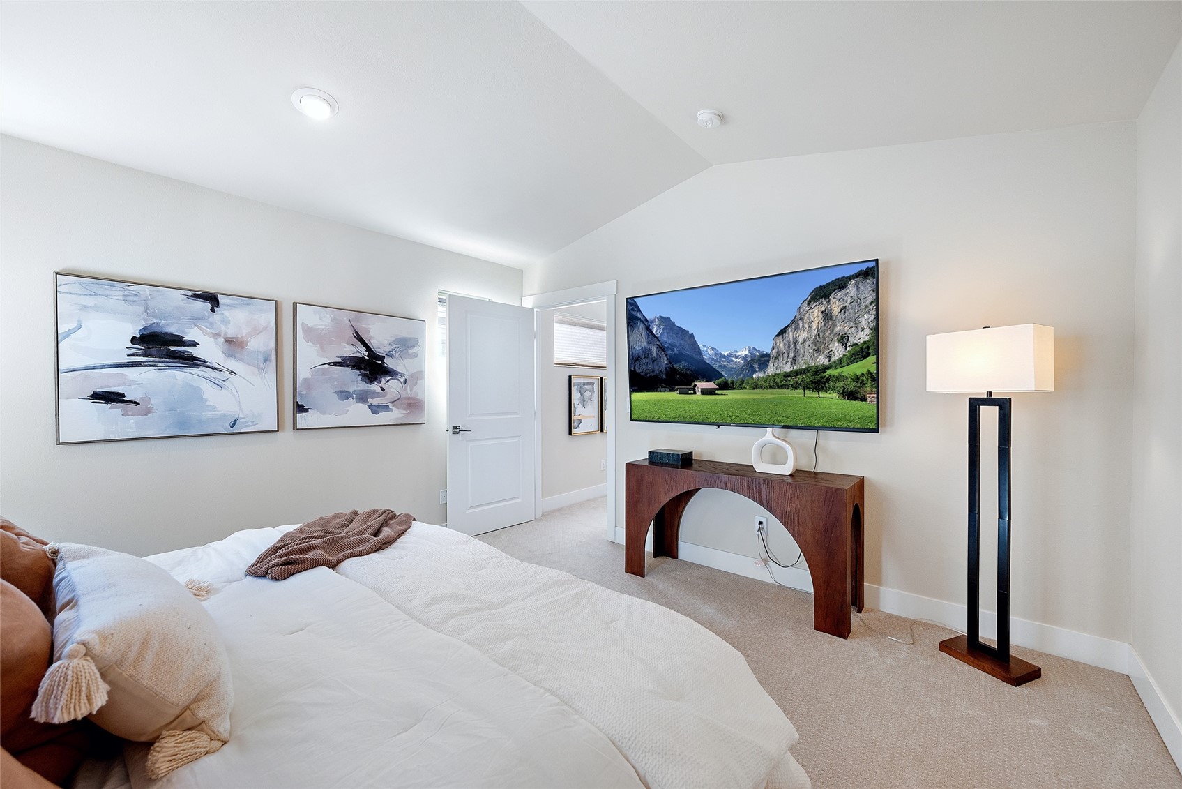 Another view of the primary bedroom.