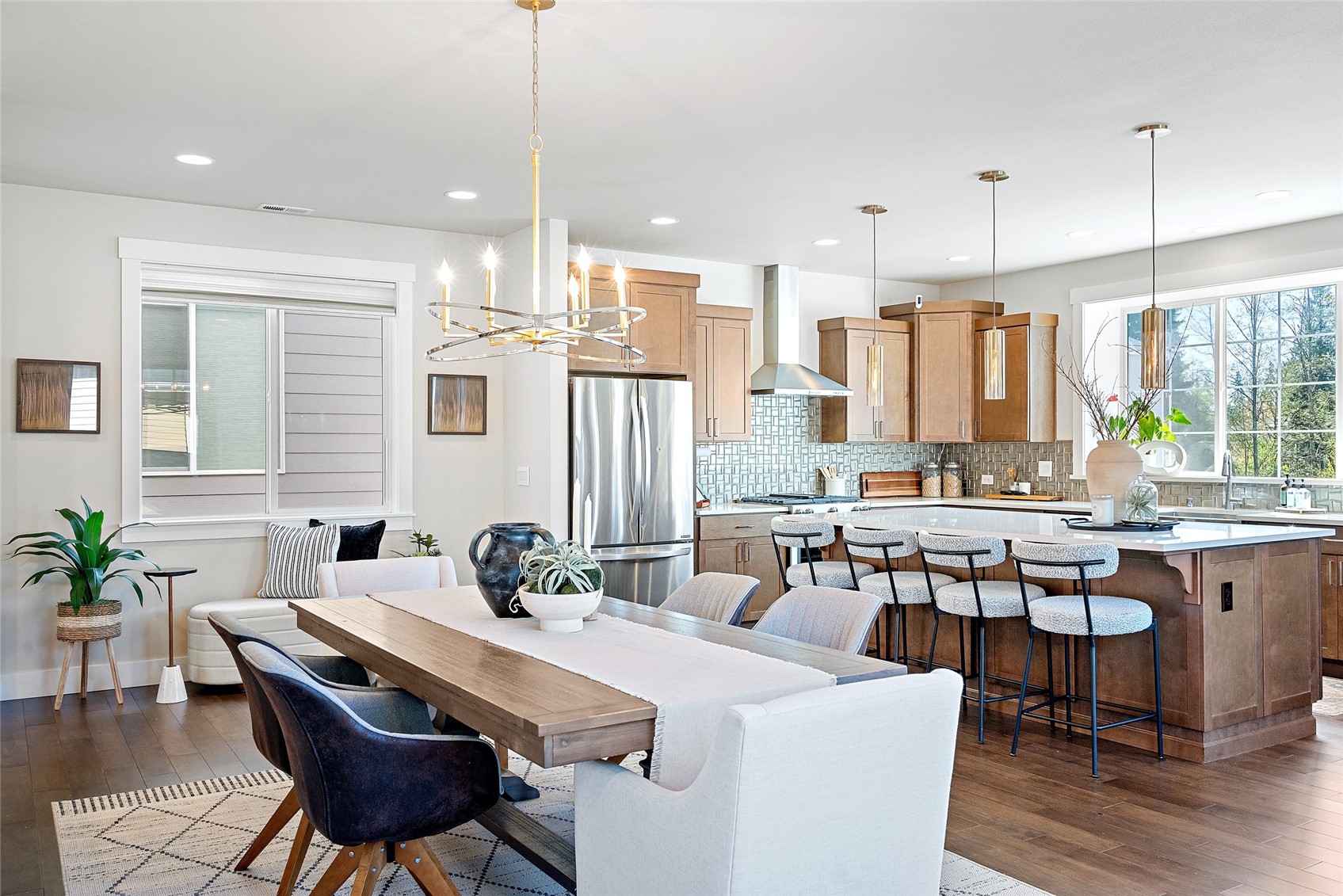 Open-concept living with the dining and kitchen in view.