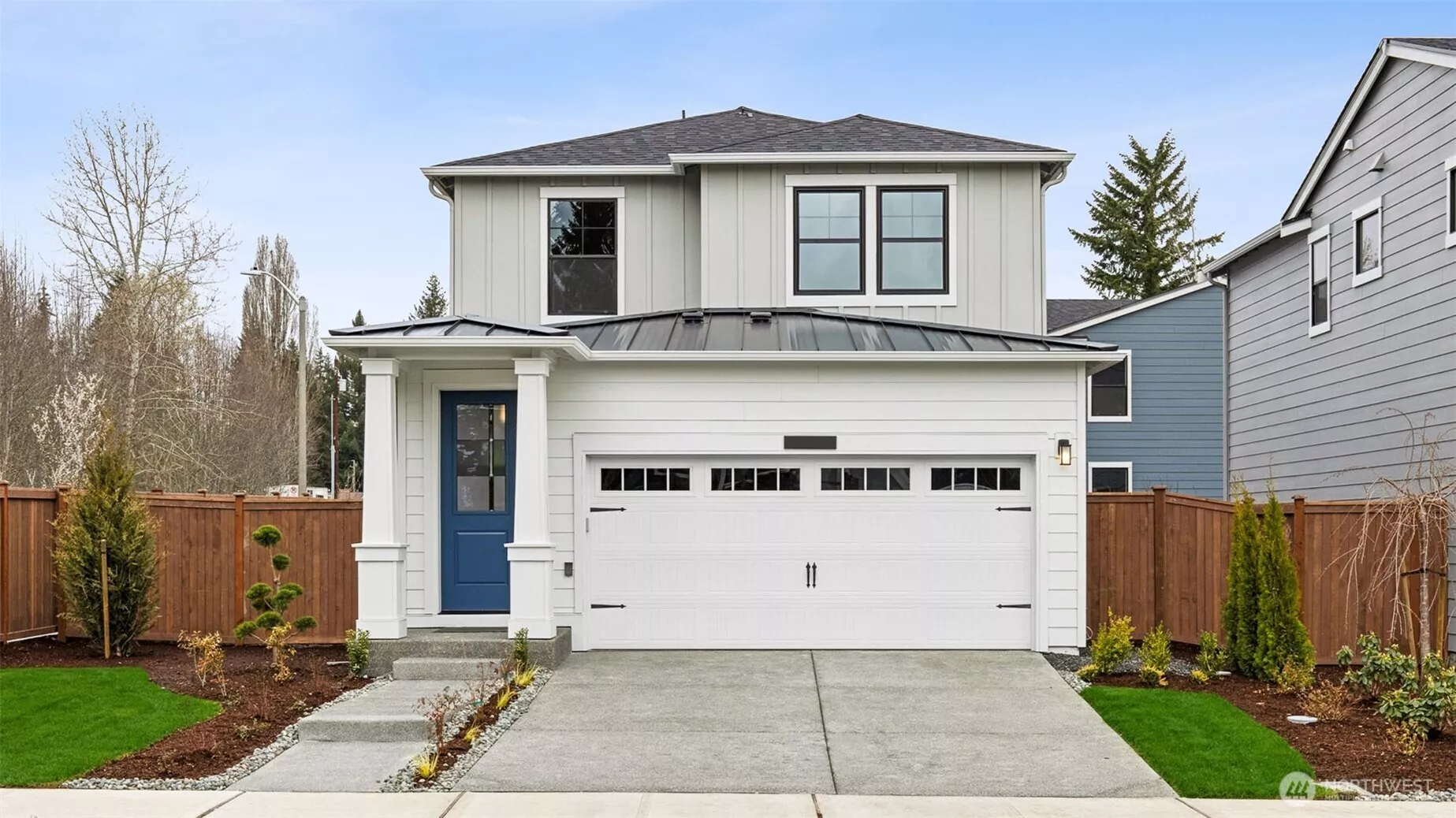 Here is the Daffodil plan on another homesite within the community showing the same elevation, the home for sale will have a different exterior color. Home for sale is located on a corner homesite in a quiet location close to Redmond and downtown Kirkland.