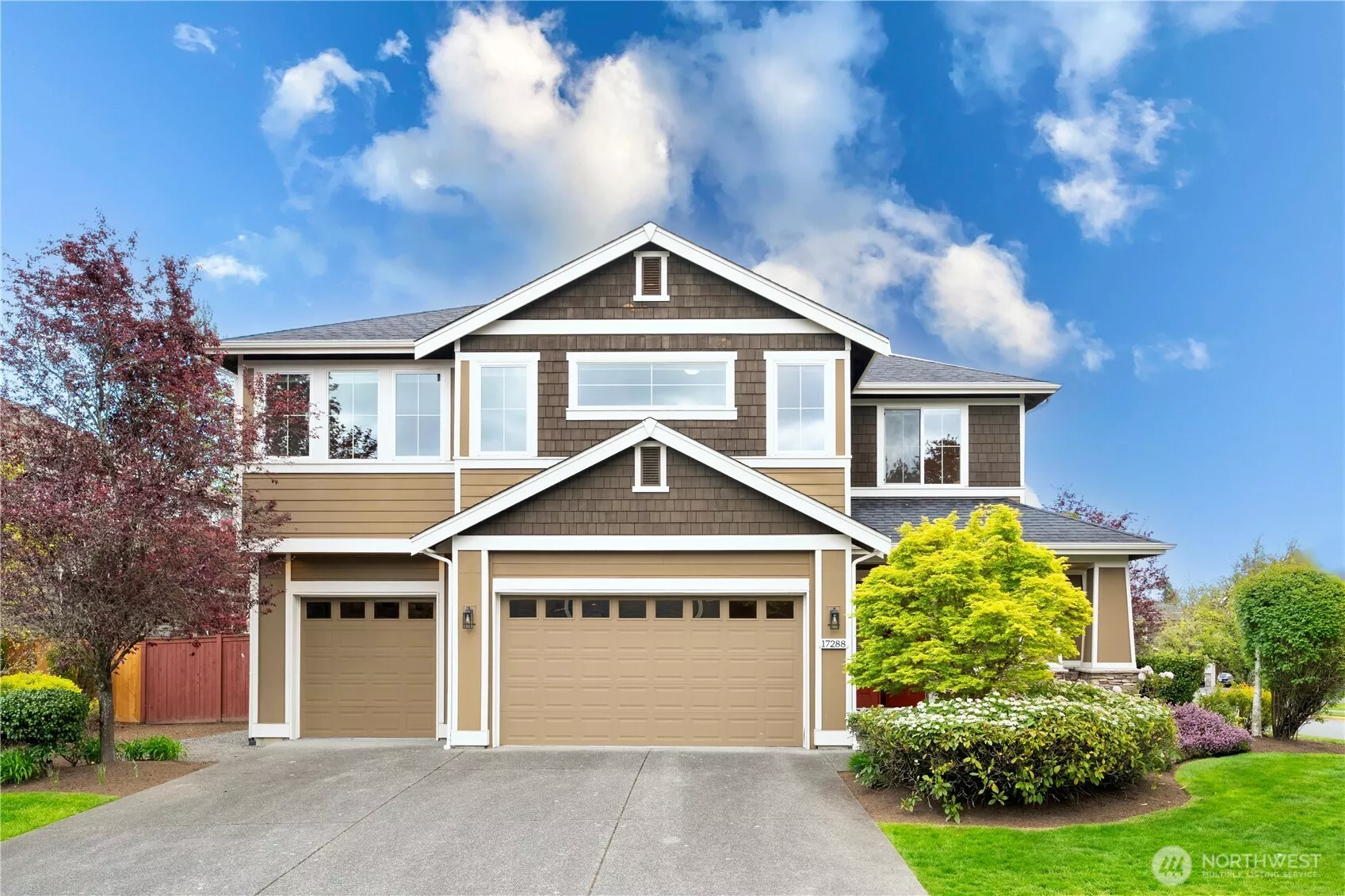 Modern 2-story home with a 3-car garage in the heart of Education Hill, featuring top-rated schools and contemporary design.
