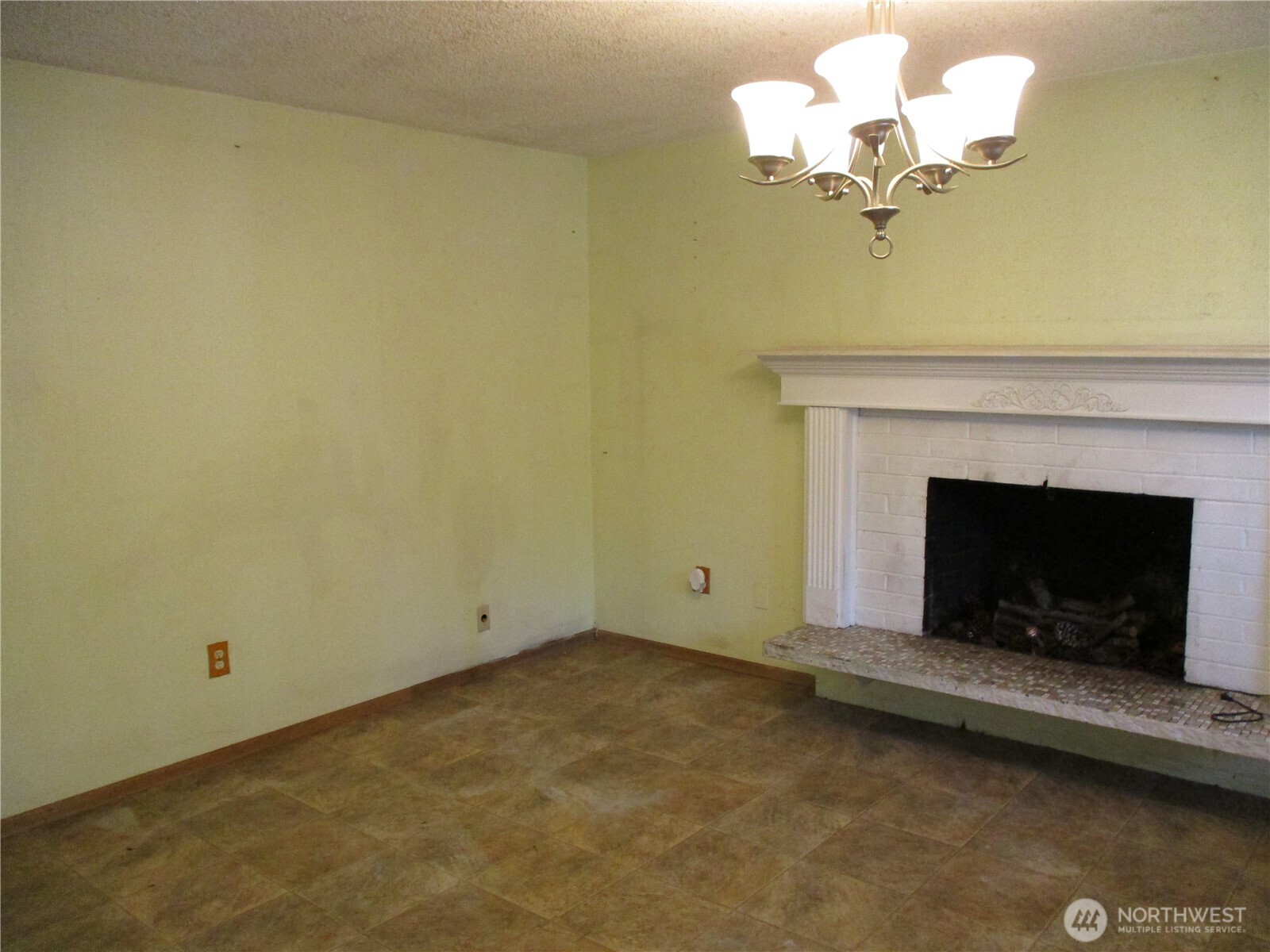 Wood fireplace in the living room.