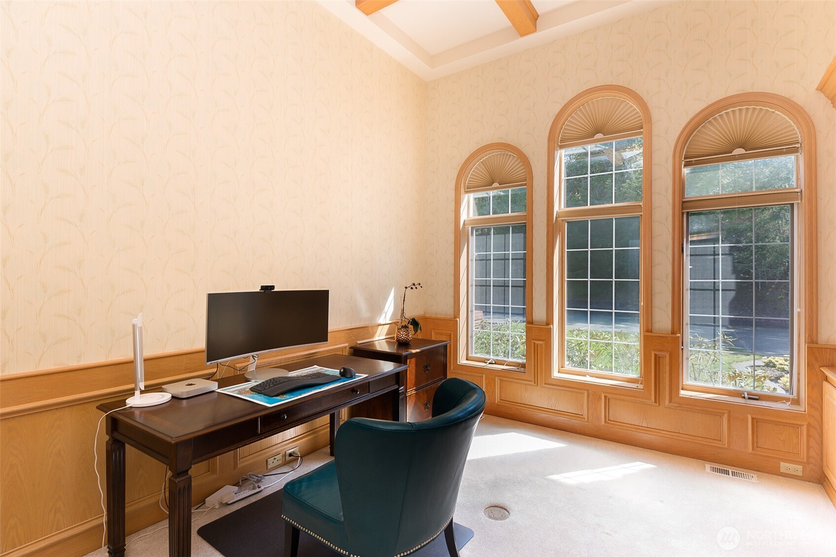 On the main level, a spacious office/library