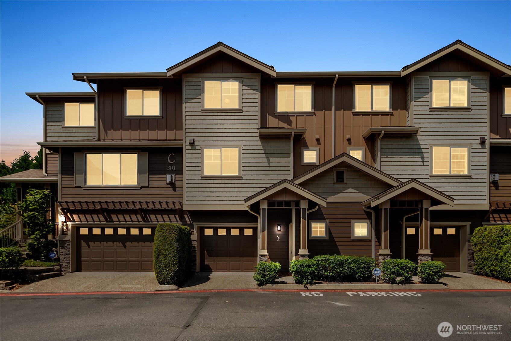 Enjoy the convenience of an attached garage, covered entryway, and private front porch.