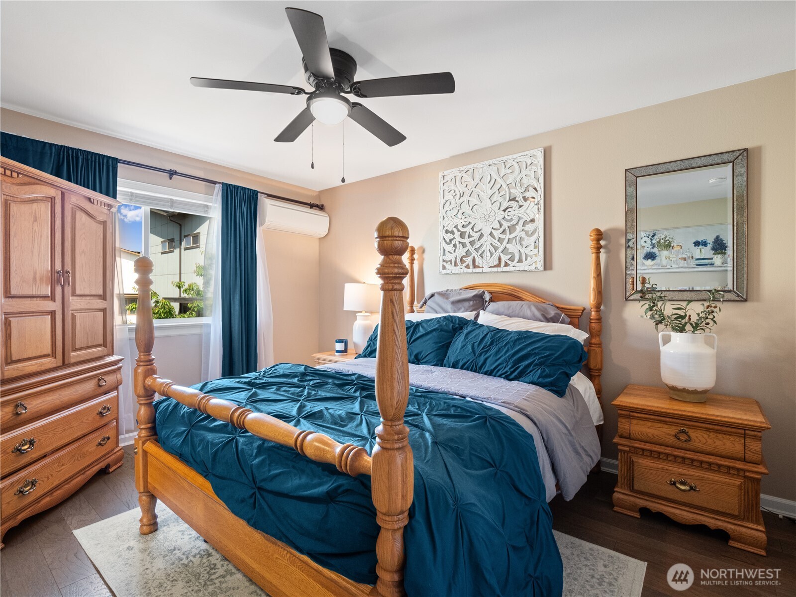Upstairs features a generous, comfortable primary bedroom with an ensuite 5-piece bathroom, offering a peaceful space for relaxation.