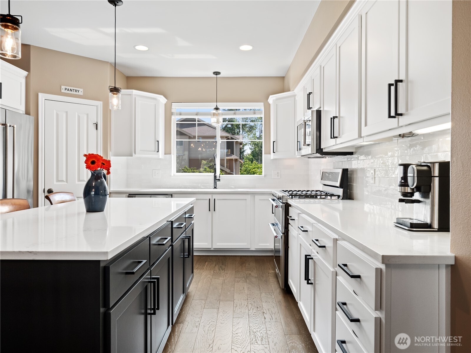 This beautifully updated kitchen is the perfect blend of modern style and everyday functionality.