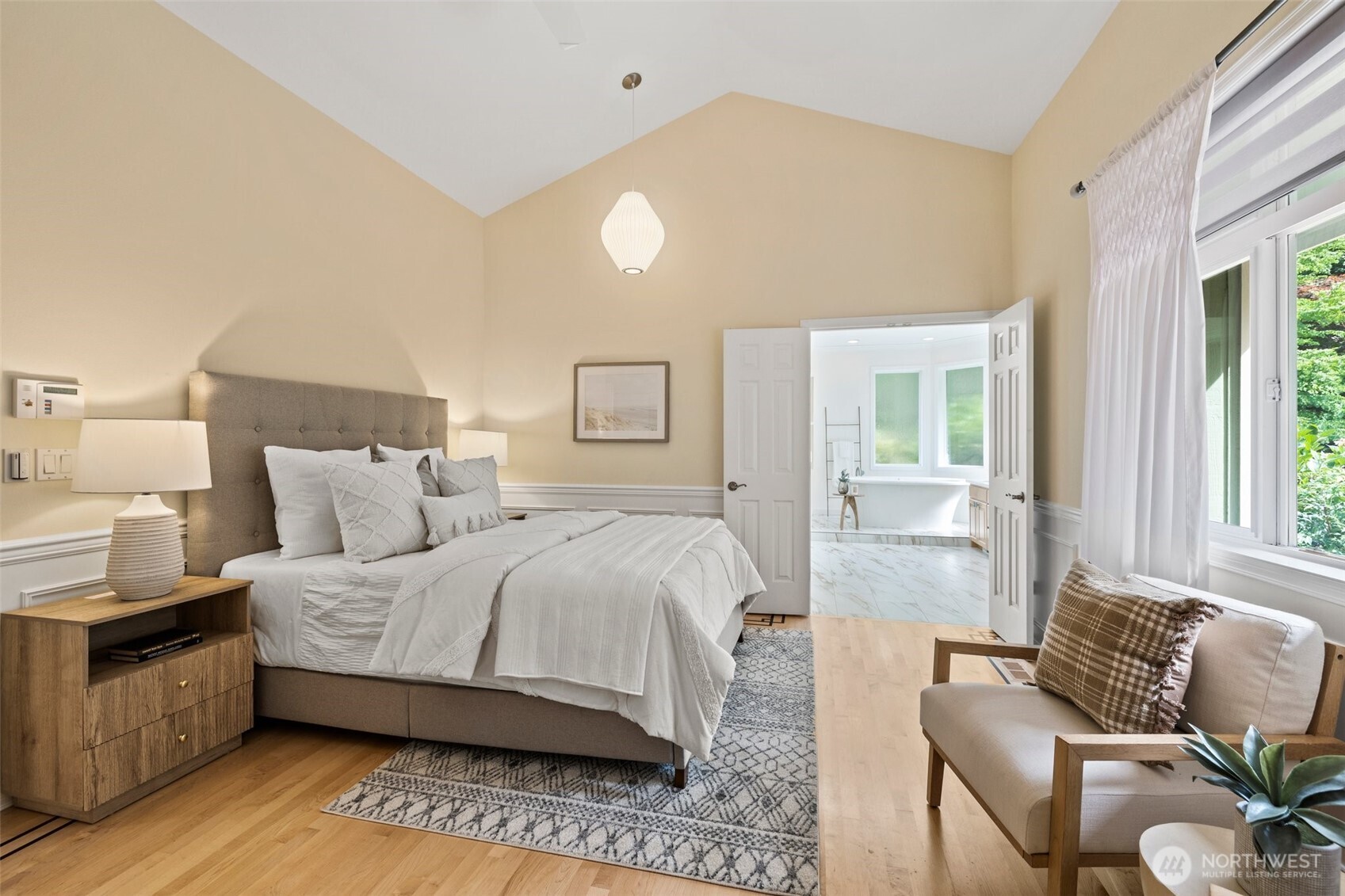 Primary bedroom with En-suite bath and walk-in closet.