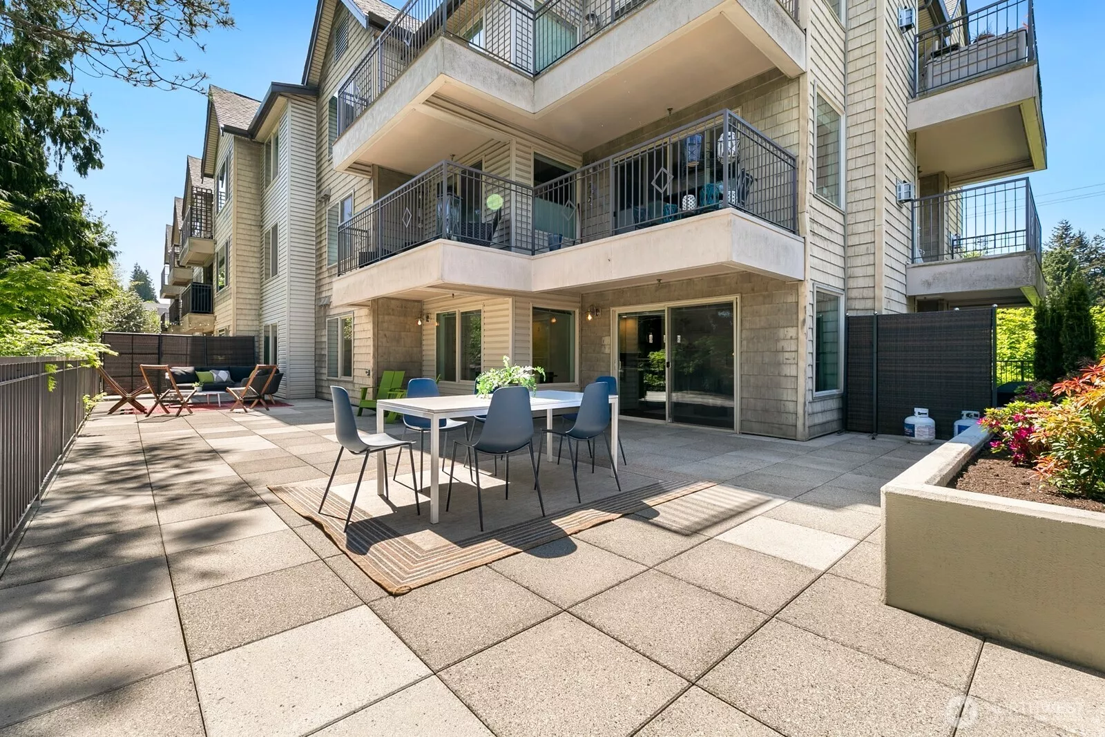 Wait until you see this patio in person! Let's head into the building and have a look.