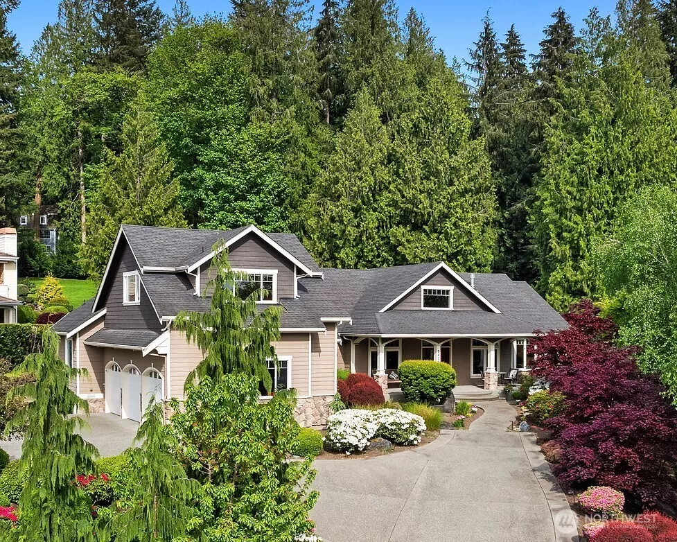 This custom home ,on a shy acre, was meticulously designed and maintained. Positioned on top of the hill and facing west, the home enjoys maximum light exposure throughout the year