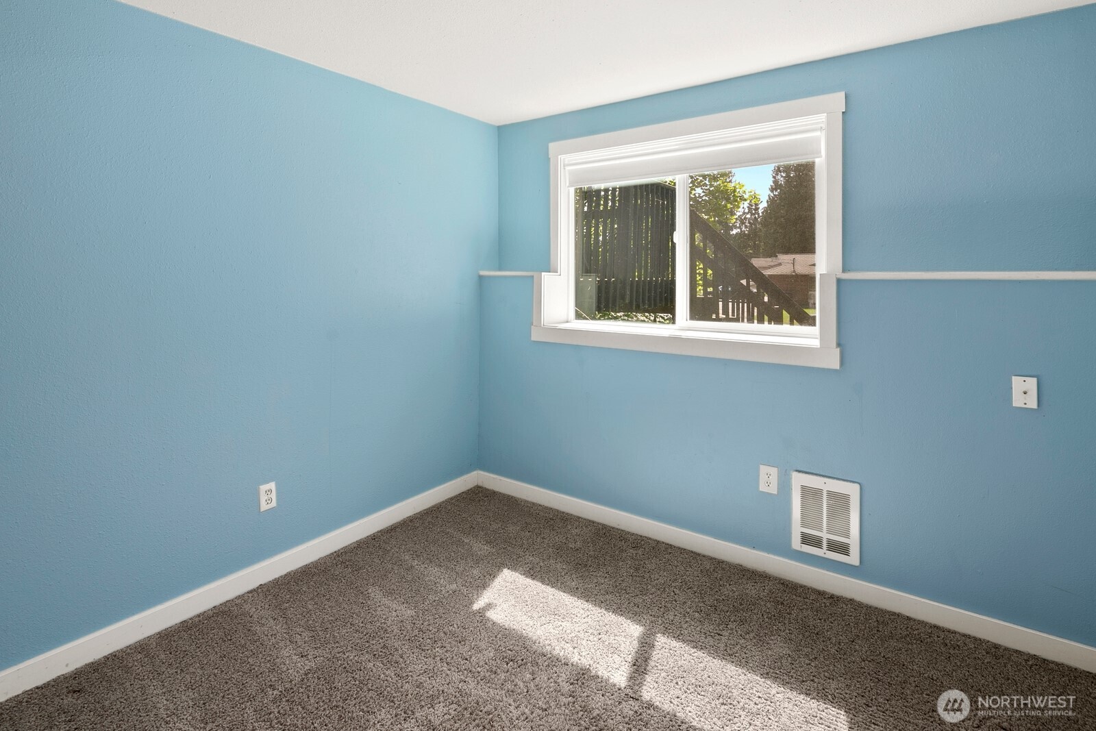 Lower bedroom, seller had windows made bigger from proper egress.