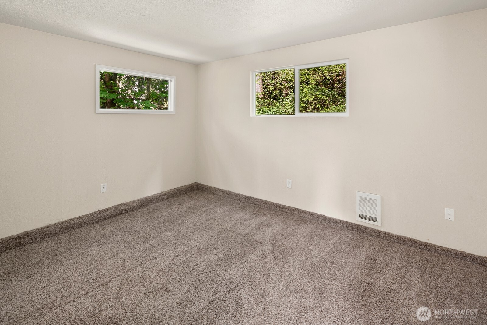 Lower bedroom, seller had windows made bigger from proper egress.