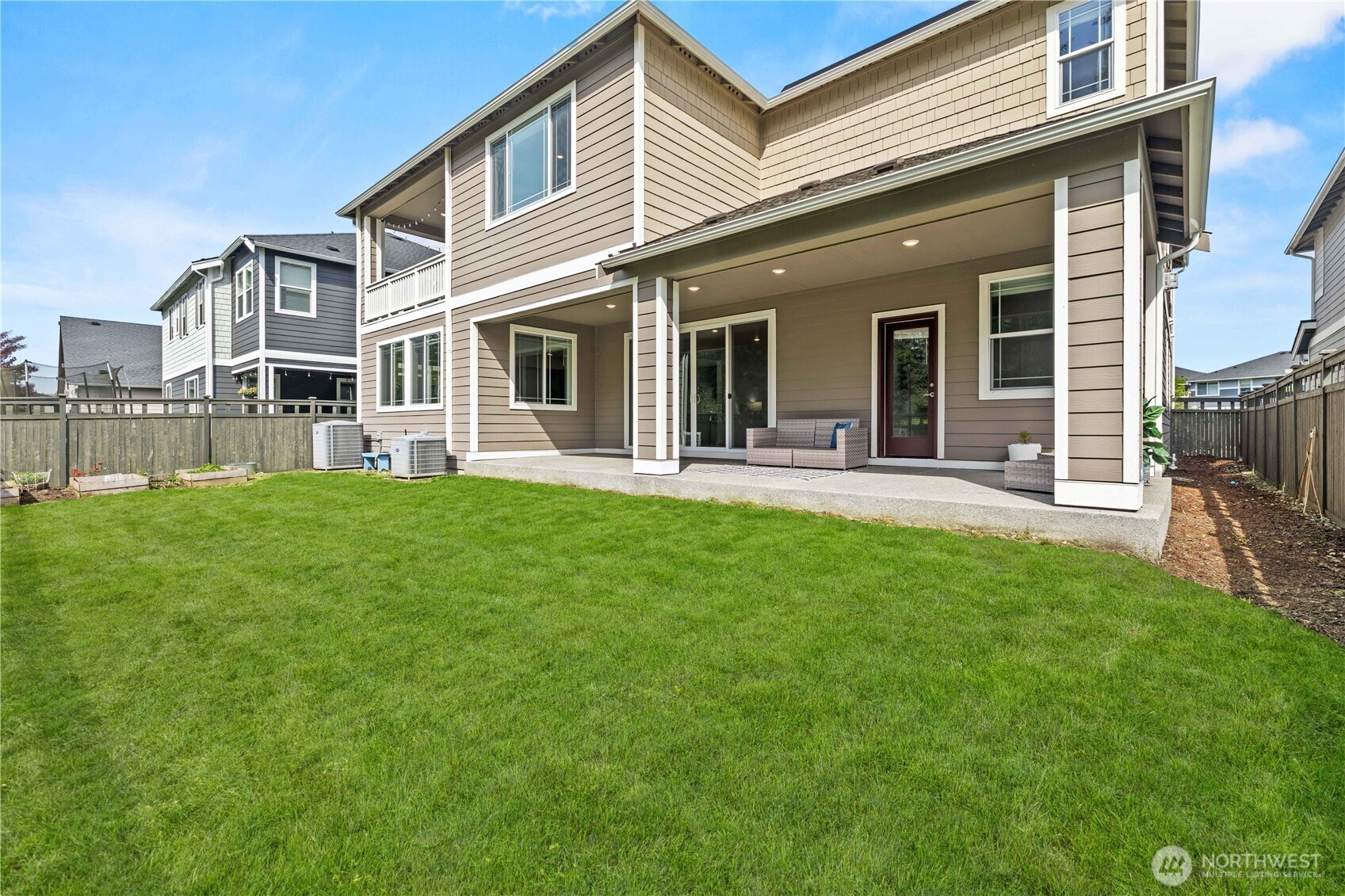 Fully Fenced Yard With Raised Garden Beds