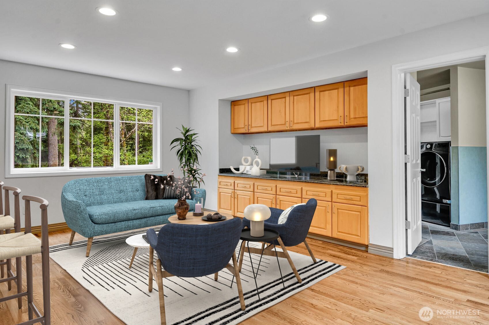 Family room with laundry and powder room beyond