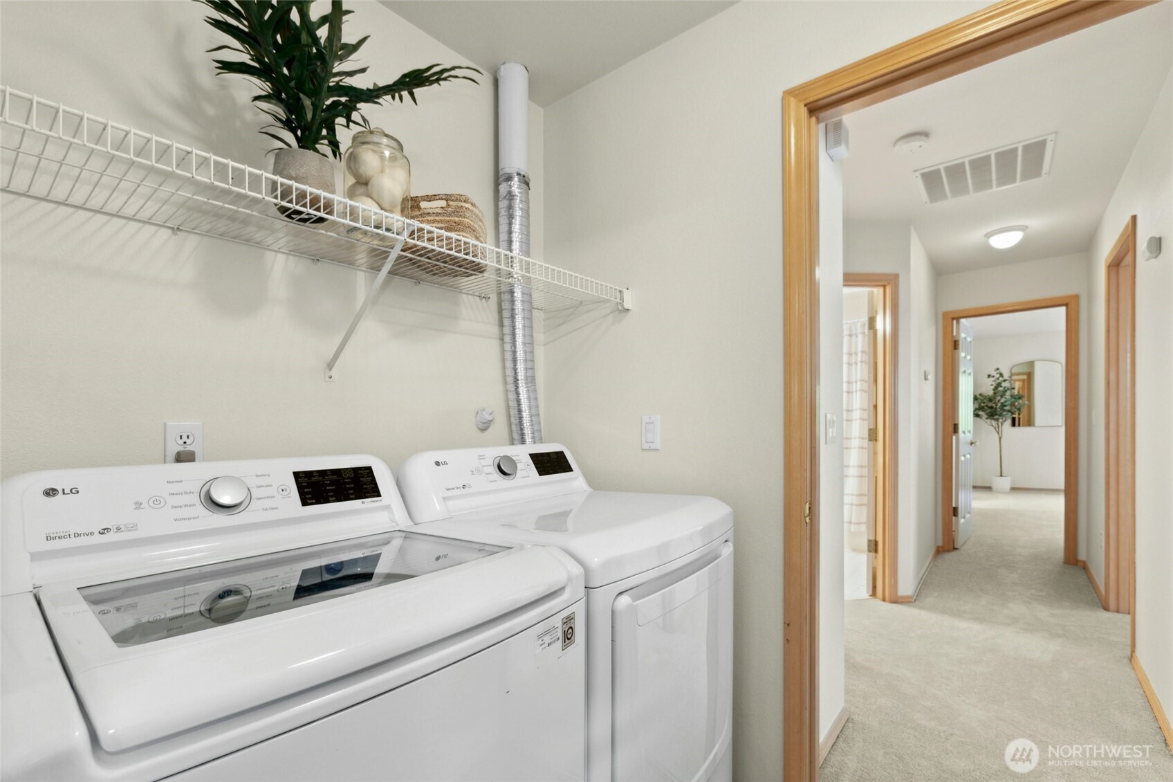 Newer washer & dryer in the utility room off the garage.