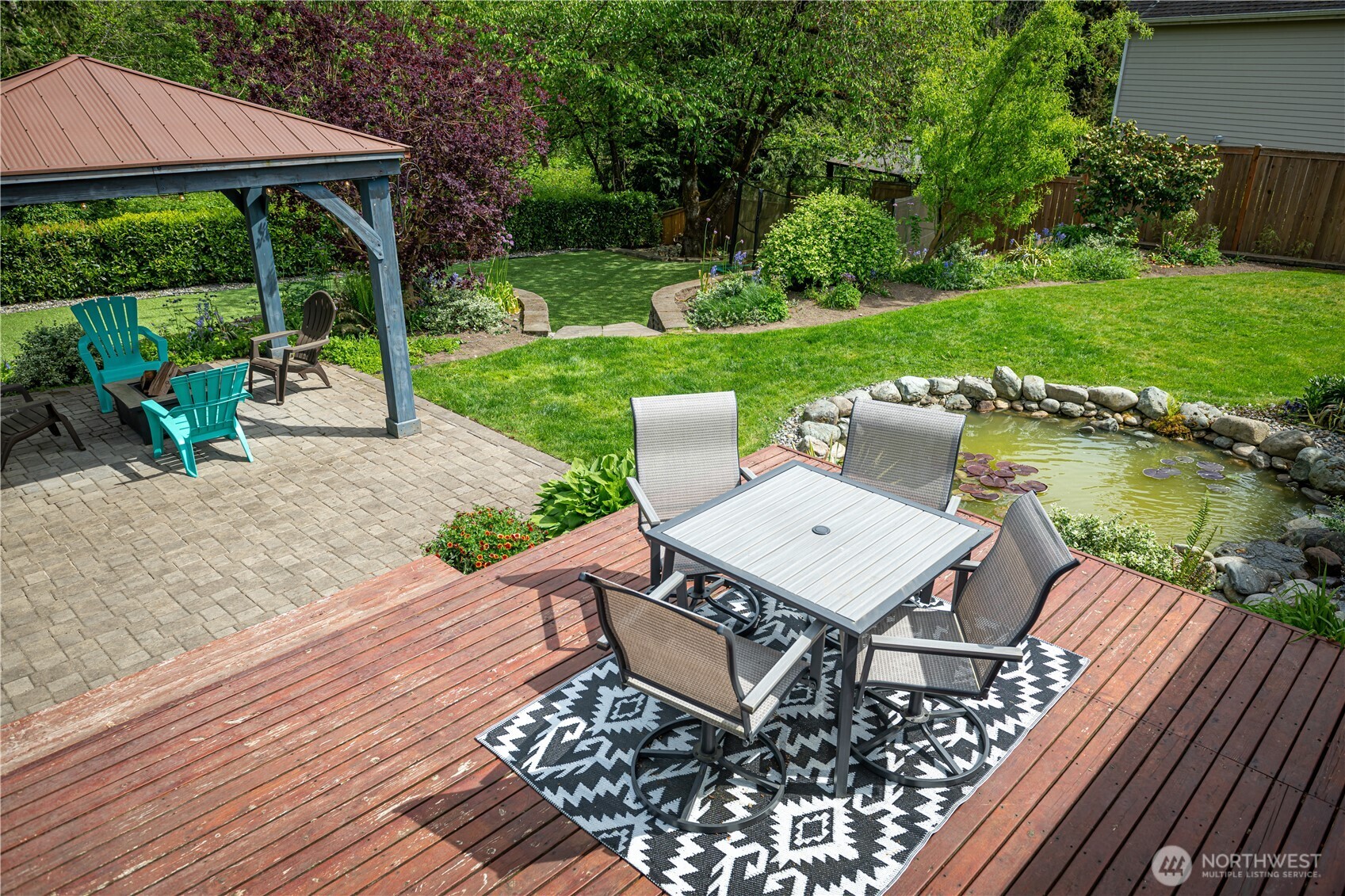 Incredible mature beautiful landscaping in the backyard