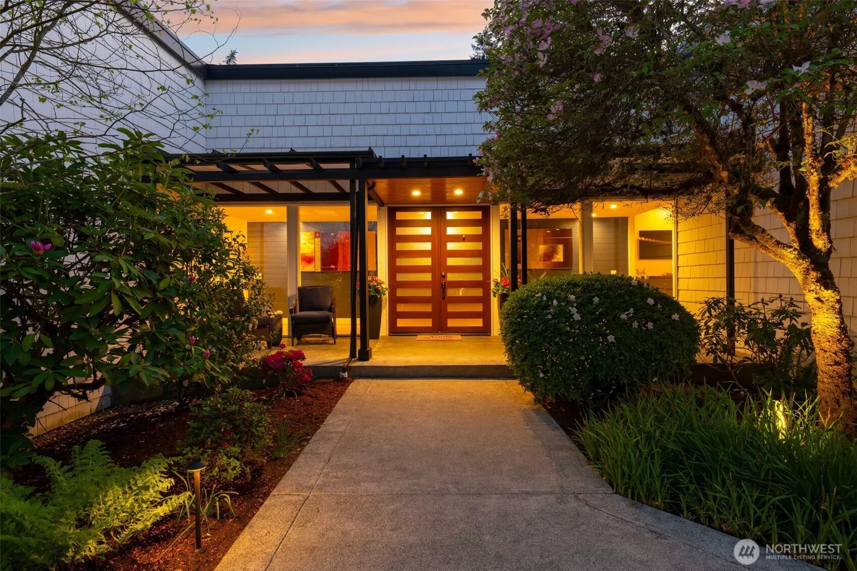 This beautiful courtyard sets the stage for the special home.