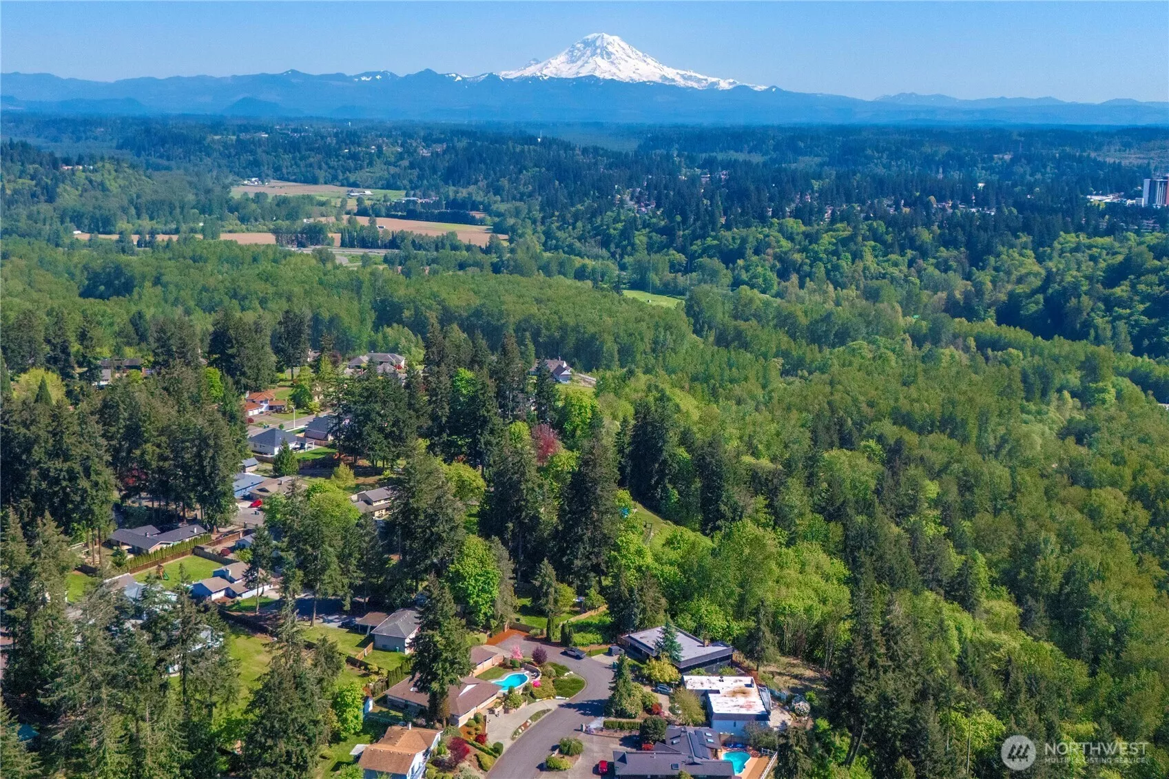 A slight slope up to a level lot with views of the Auburn Valley