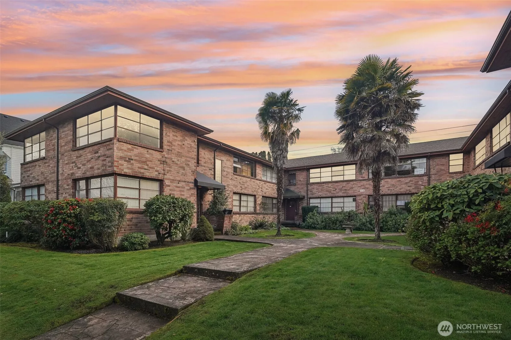 A one-car garage with alley access completes the package, offering both security & convenience.