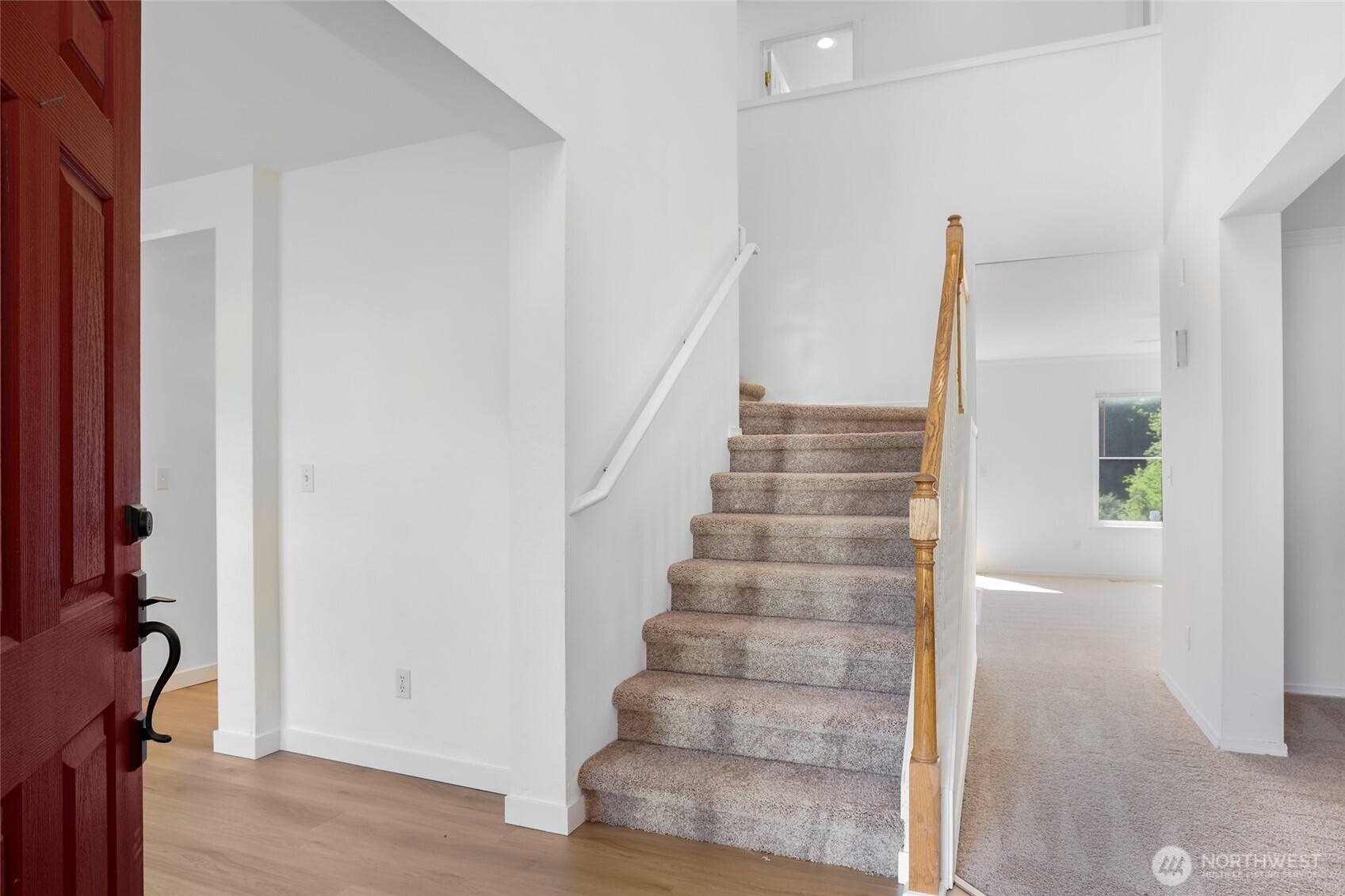 Enter to vaulted ceilings, front room and dining room.