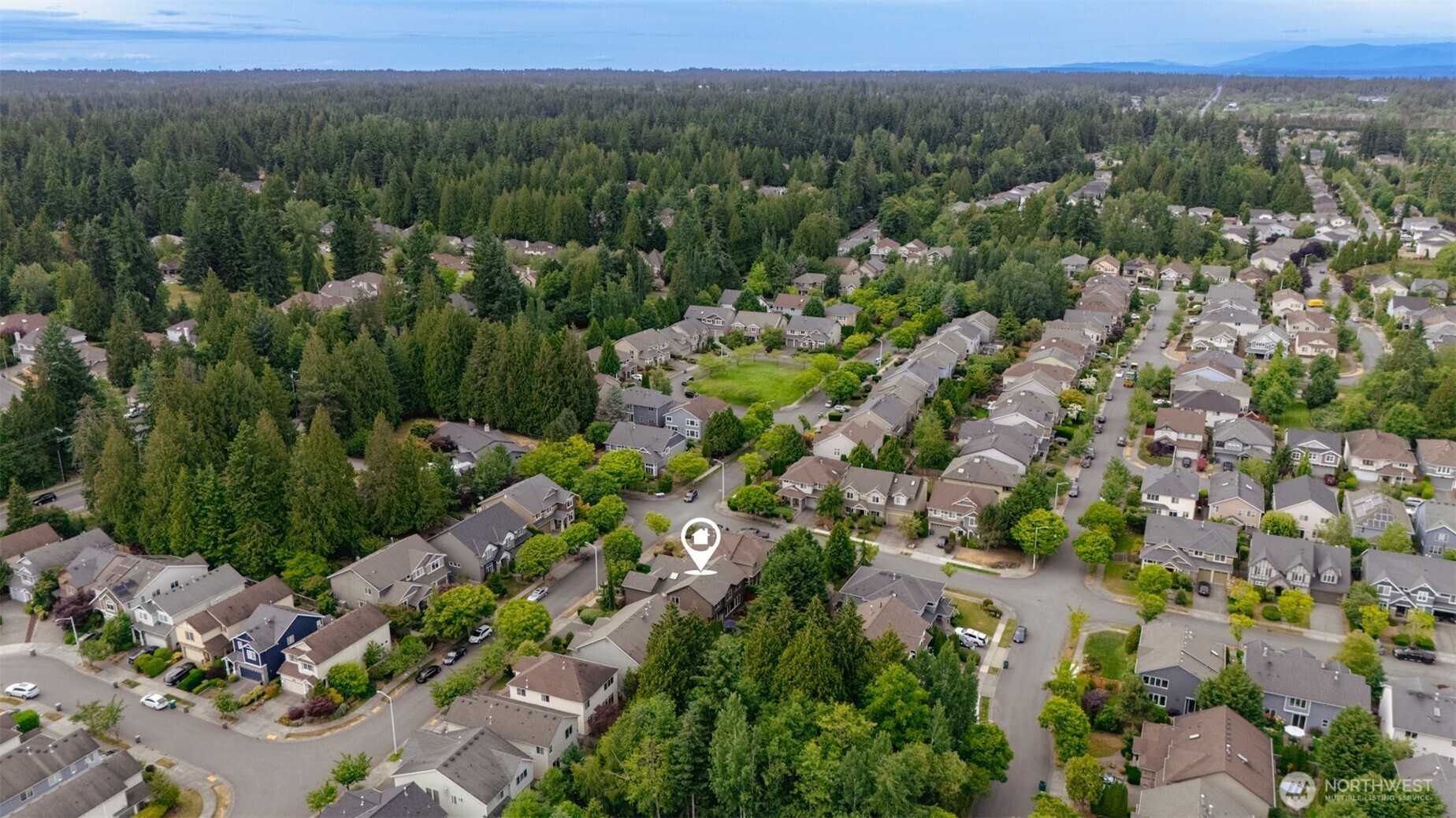 Another view of your tranquil, tree-lined neighborhood — nestled close to parks, trails, and top-rated schools!”