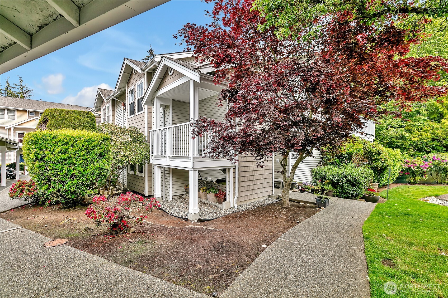 Well-landscaped side entrance
