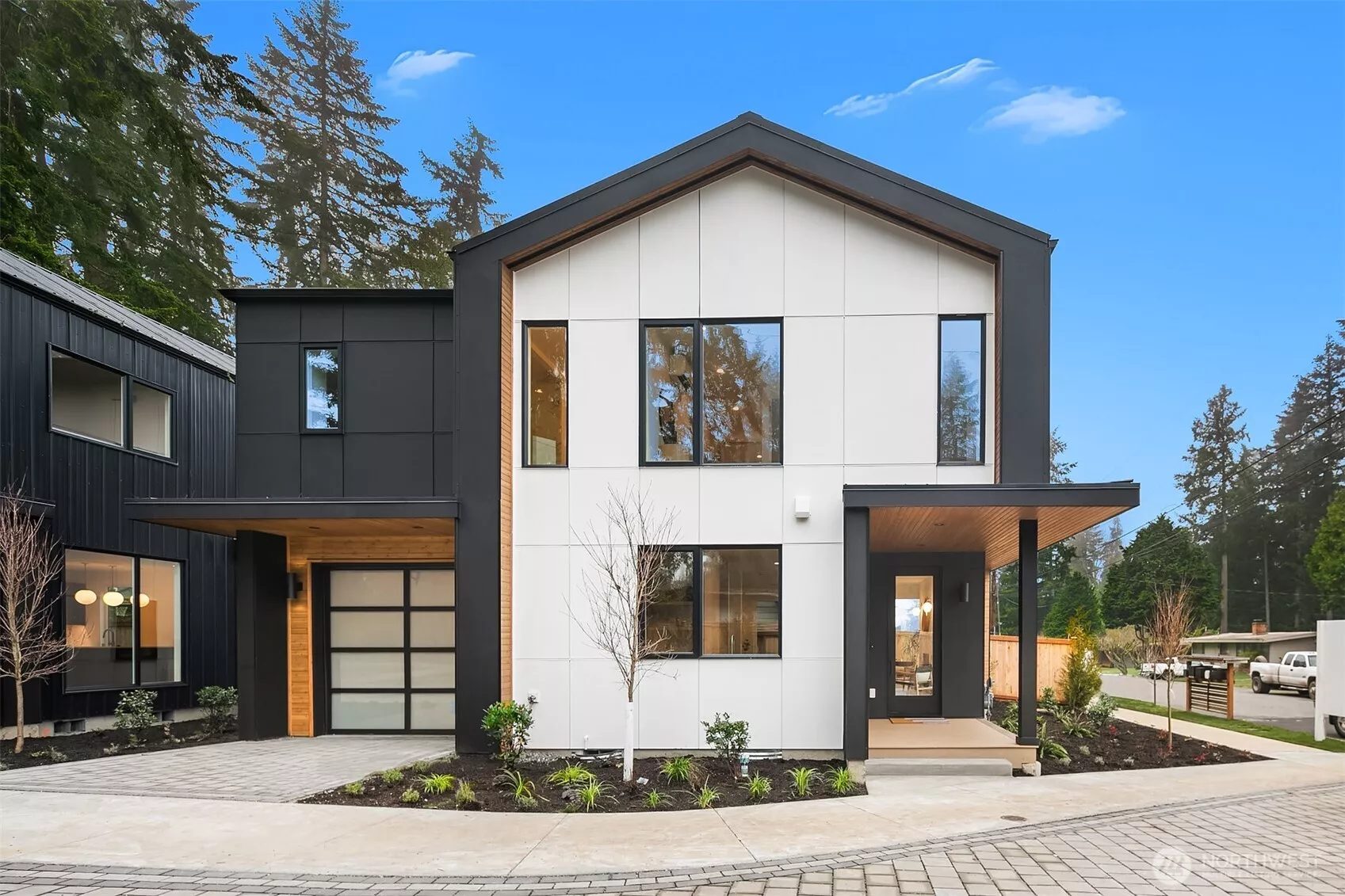 Attached EV-Ready Garage + Guest Parking