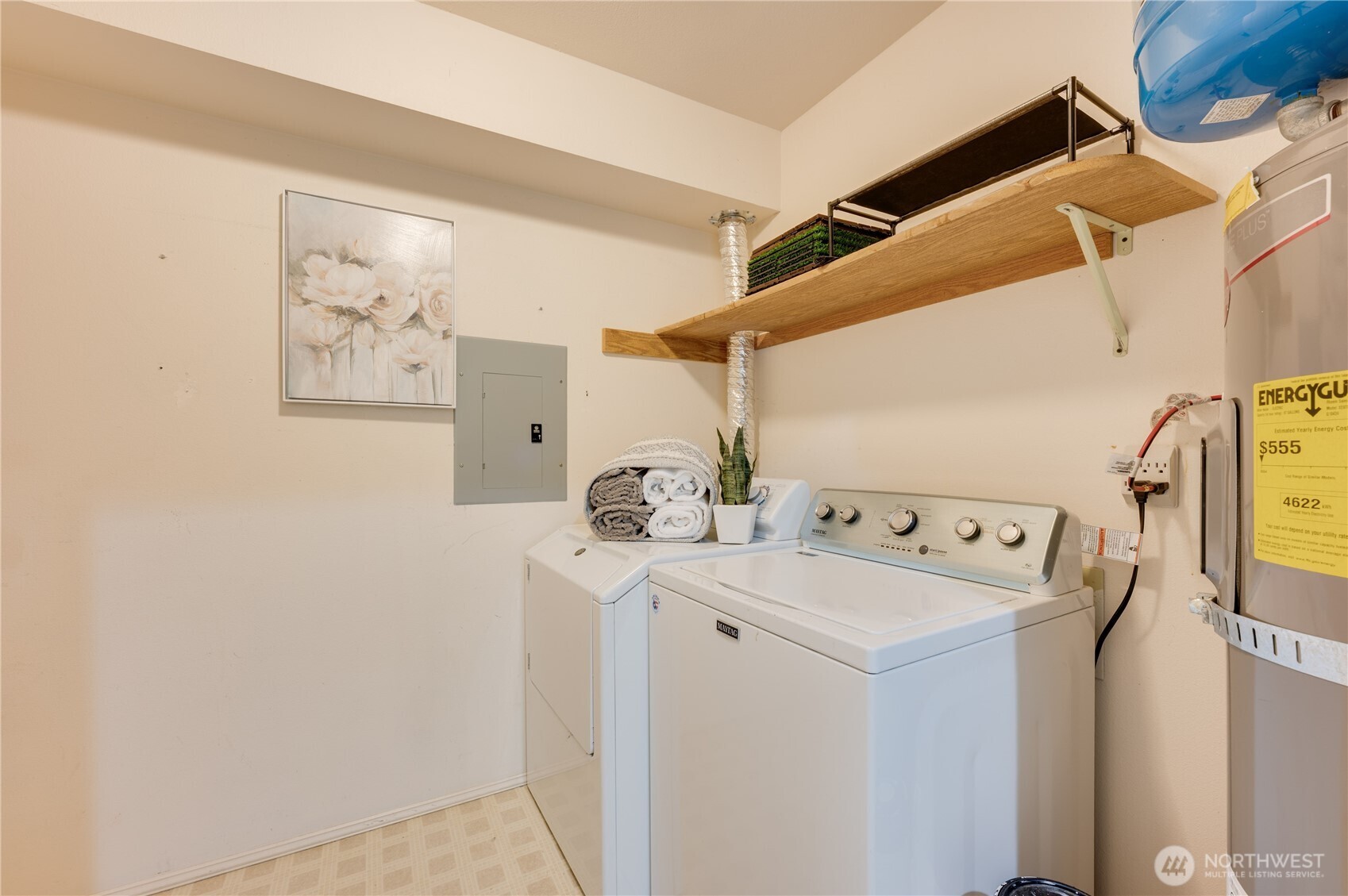 laundry room with lots of storage