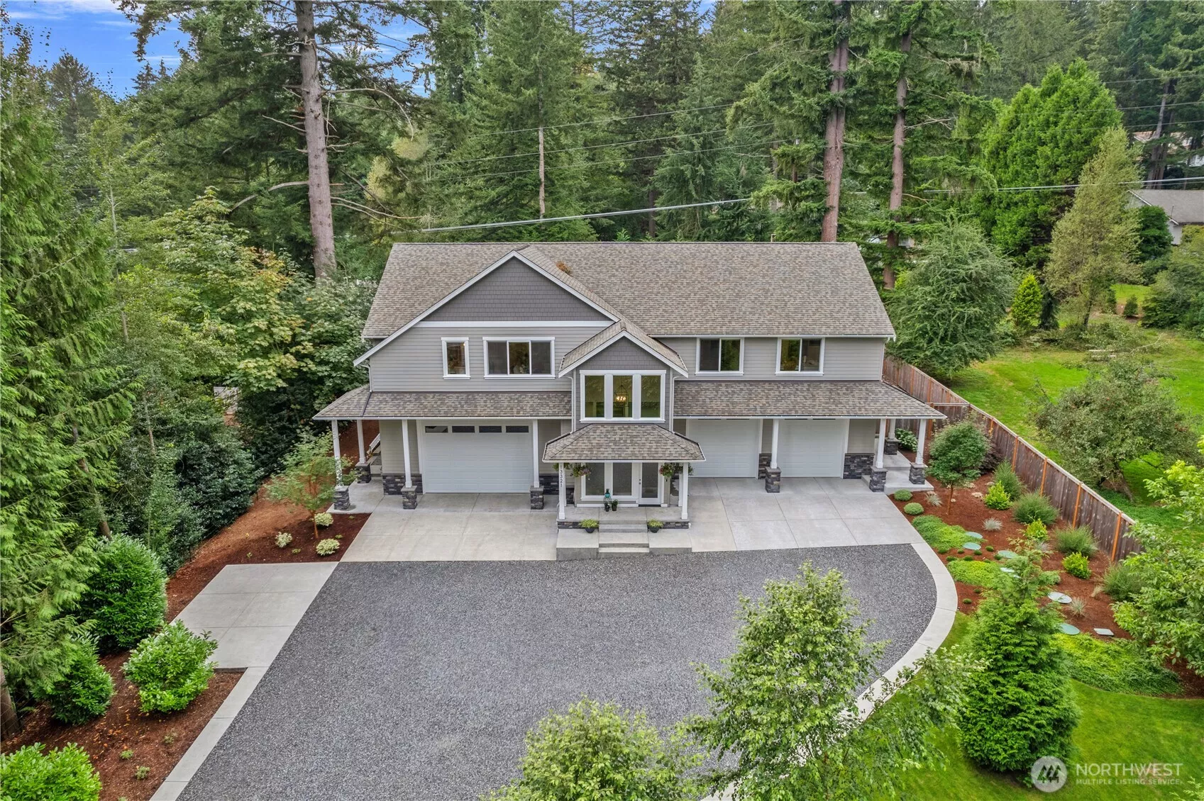 Builders Own Multigenerational Home. This home is perfectly designed for multigenerational living or extended households, offering TWO fully separate living spaces. Each side boasts its own spacious Kitchen w/oversized islands, ideal for both everyday living & hosting.