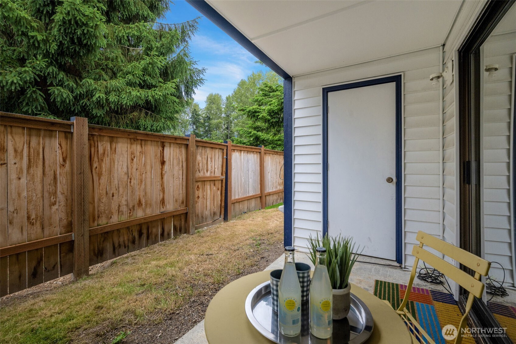 Private patio area outside living room perfect for relaxing. Storage shed too!